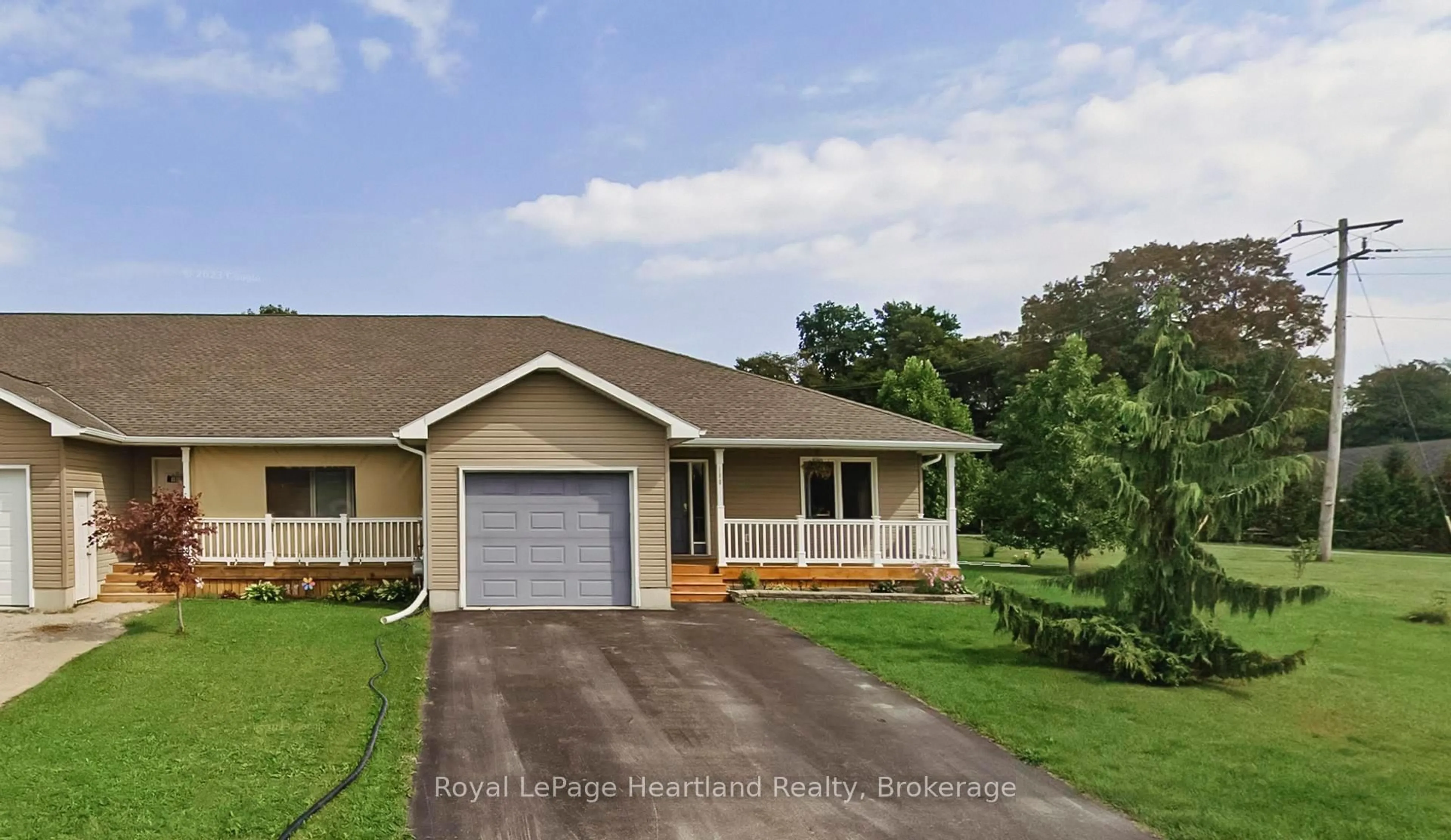 Home with vinyl exterior material, street for 180 Toronto Blvd, Huron East Ontario N0M 1L0