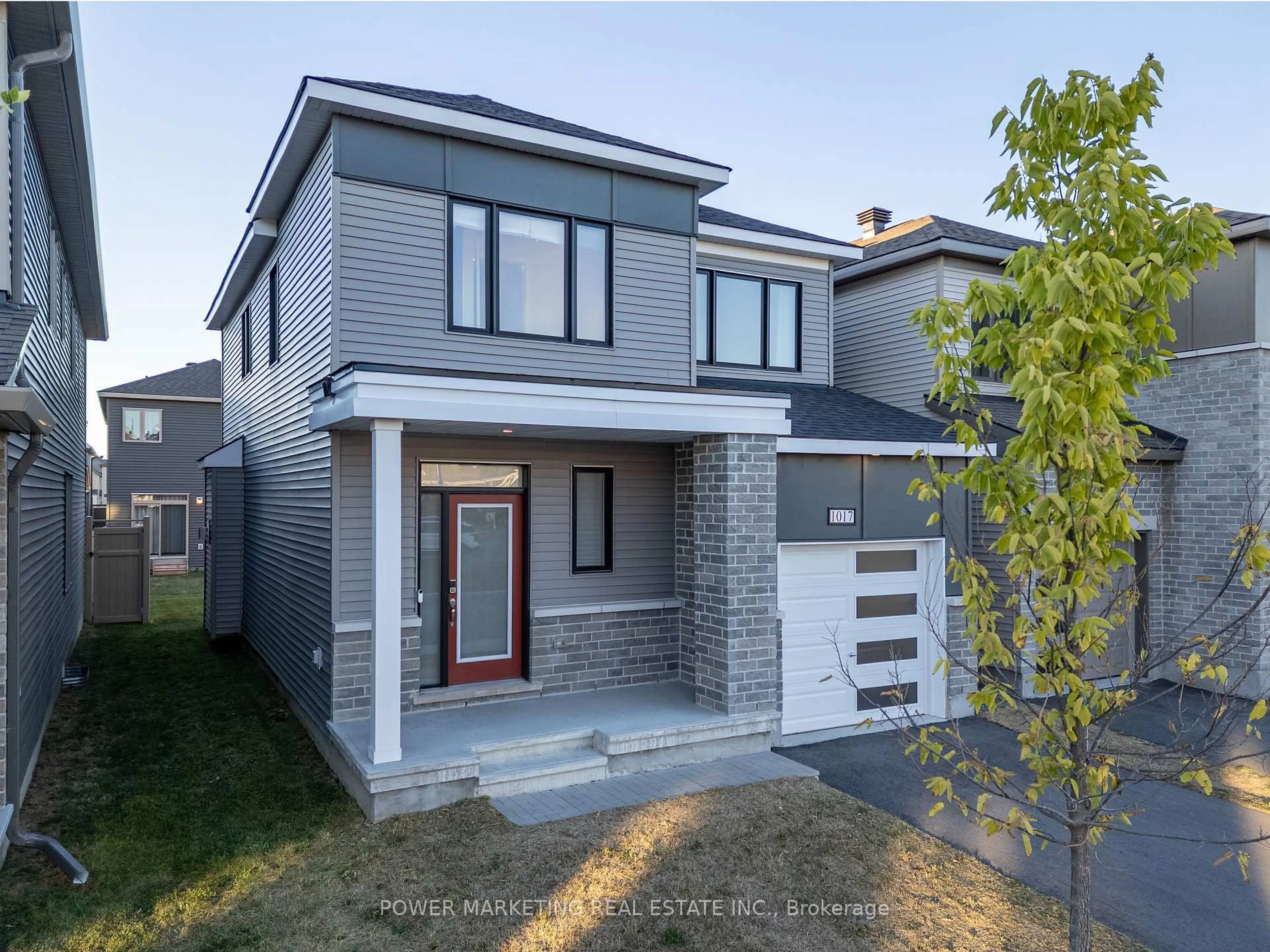 Home with brick exterior material, street for 1017 Curraglass Walk, Stittsville Ontario K2S 3A6