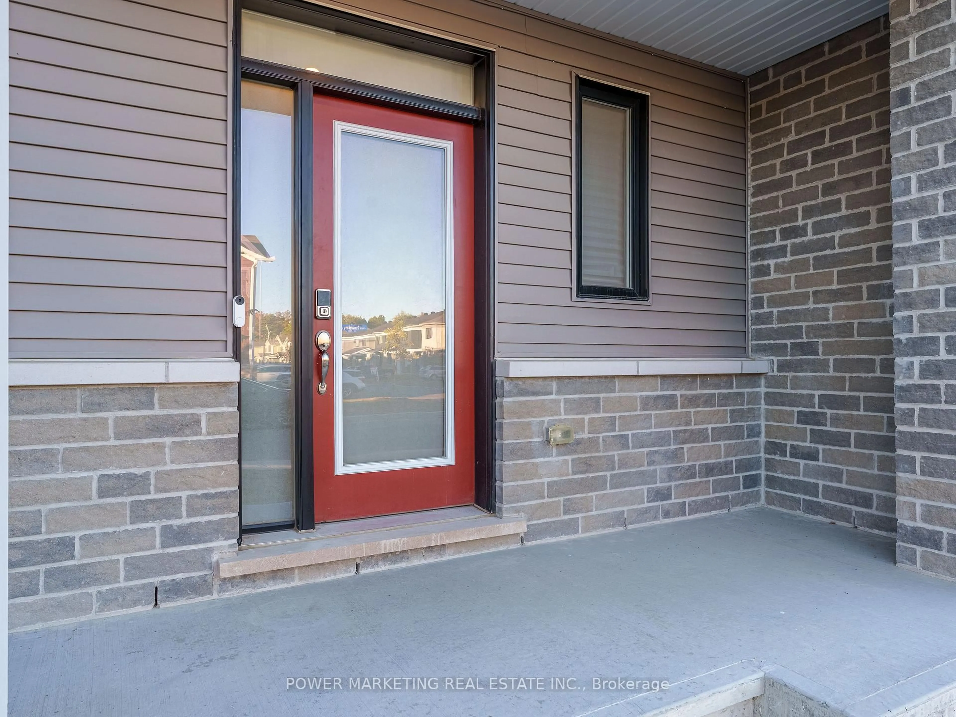 Home with brick exterior material, street for 1017 Curraglass Walk, Stittsville Ontario K2S 3A6