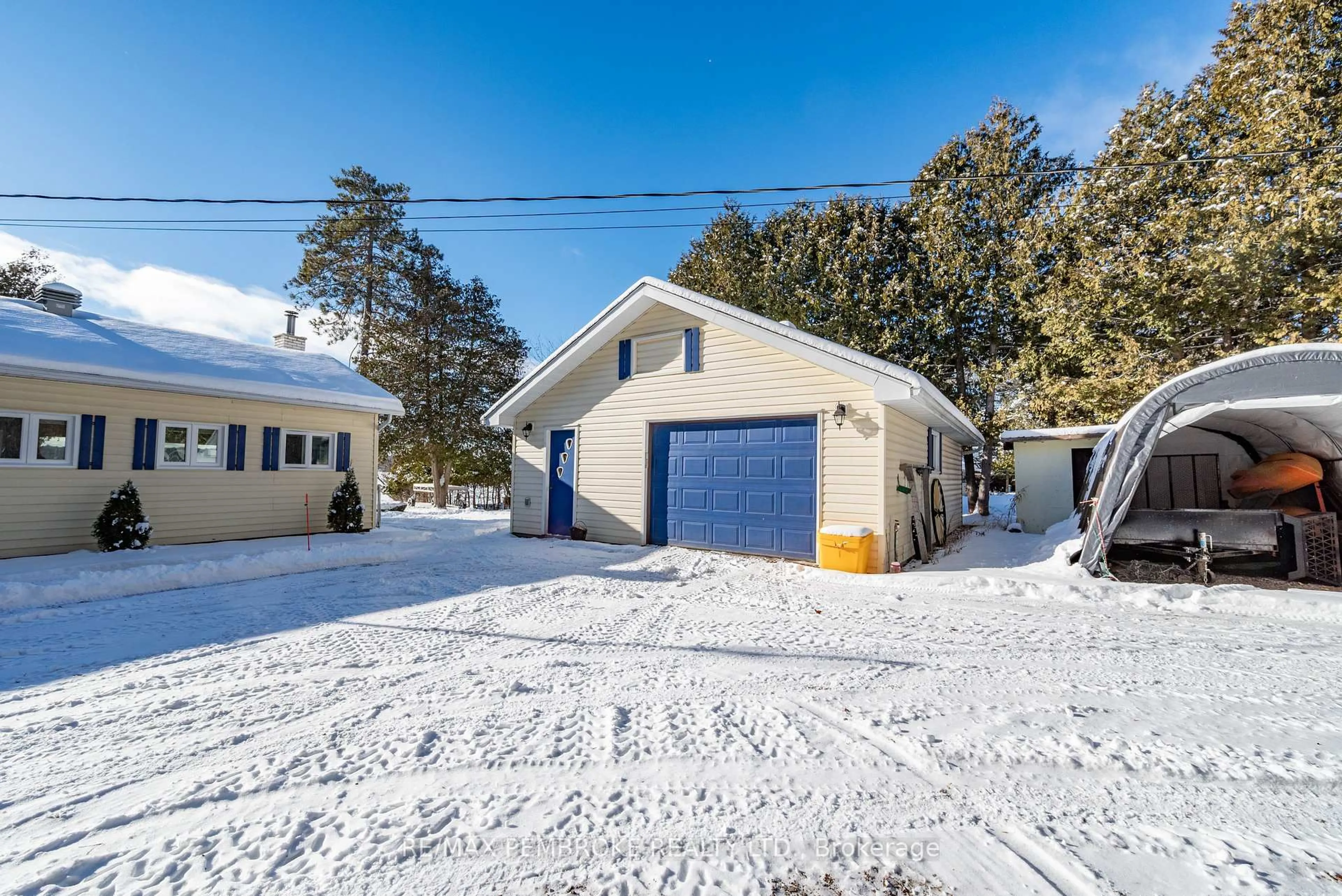 A pic from outside/outdoor area/front of a property/back of a property/a pic from drone, street for 229 Holiday Lane, Eganville Ontario K0J 1T0