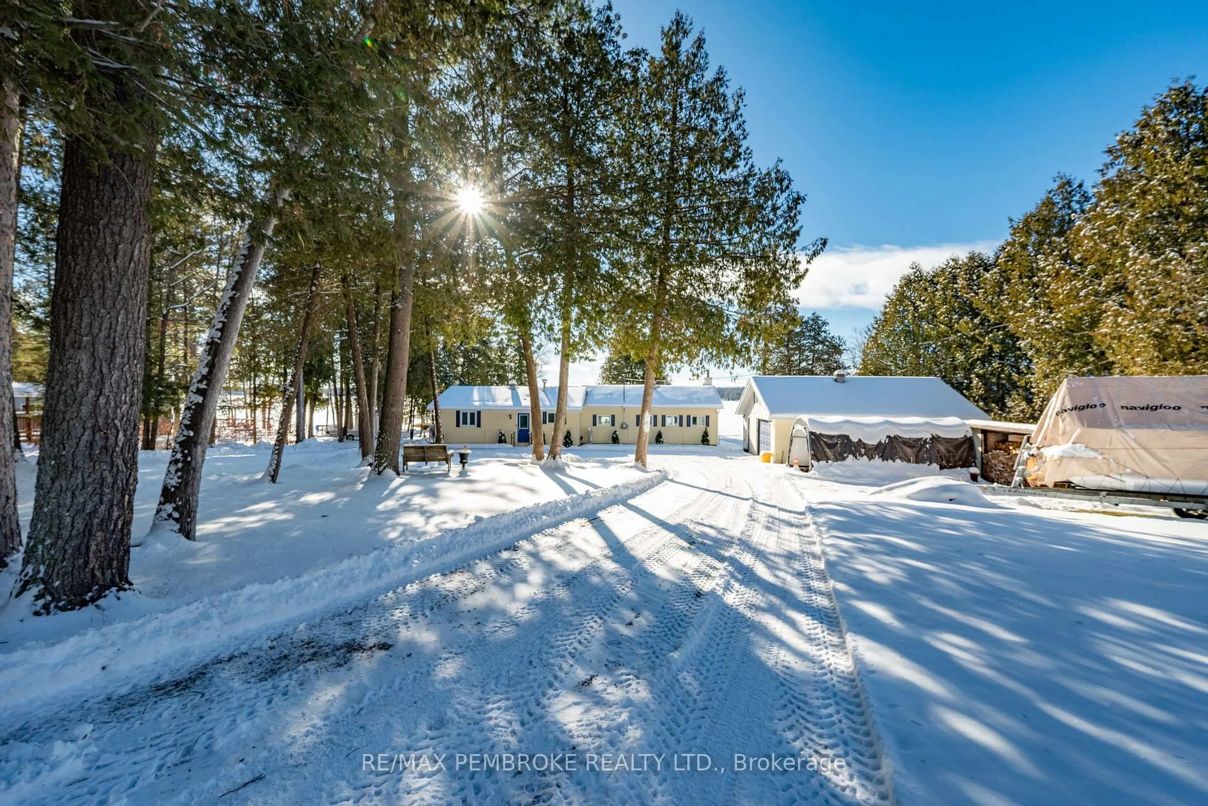 A pic from outside/outdoor area/front of a property/back of a property/a pic from drone, forest/trees view for 229 Holiday Lane, Eganville Ontario K0J 1T0
