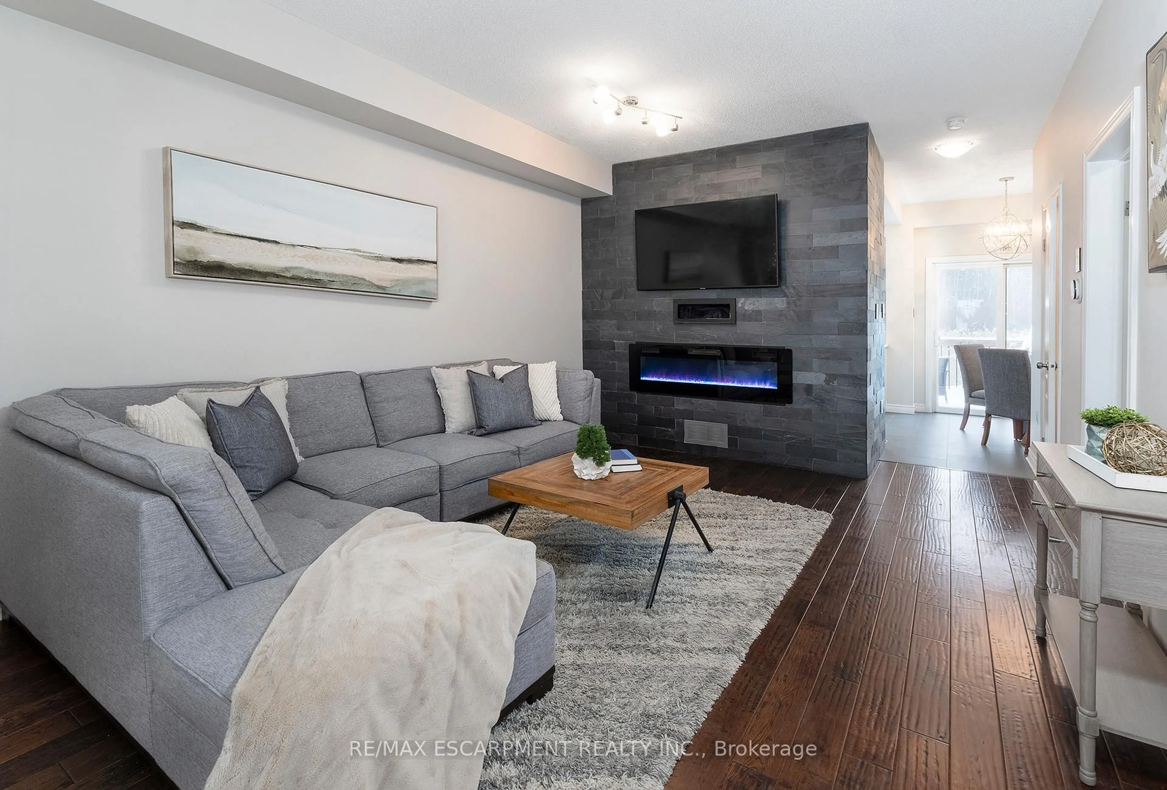 Living room with furniture, unknown for 105 Liddycoat Lane #67, Hamilton Ontario L9G 0A7