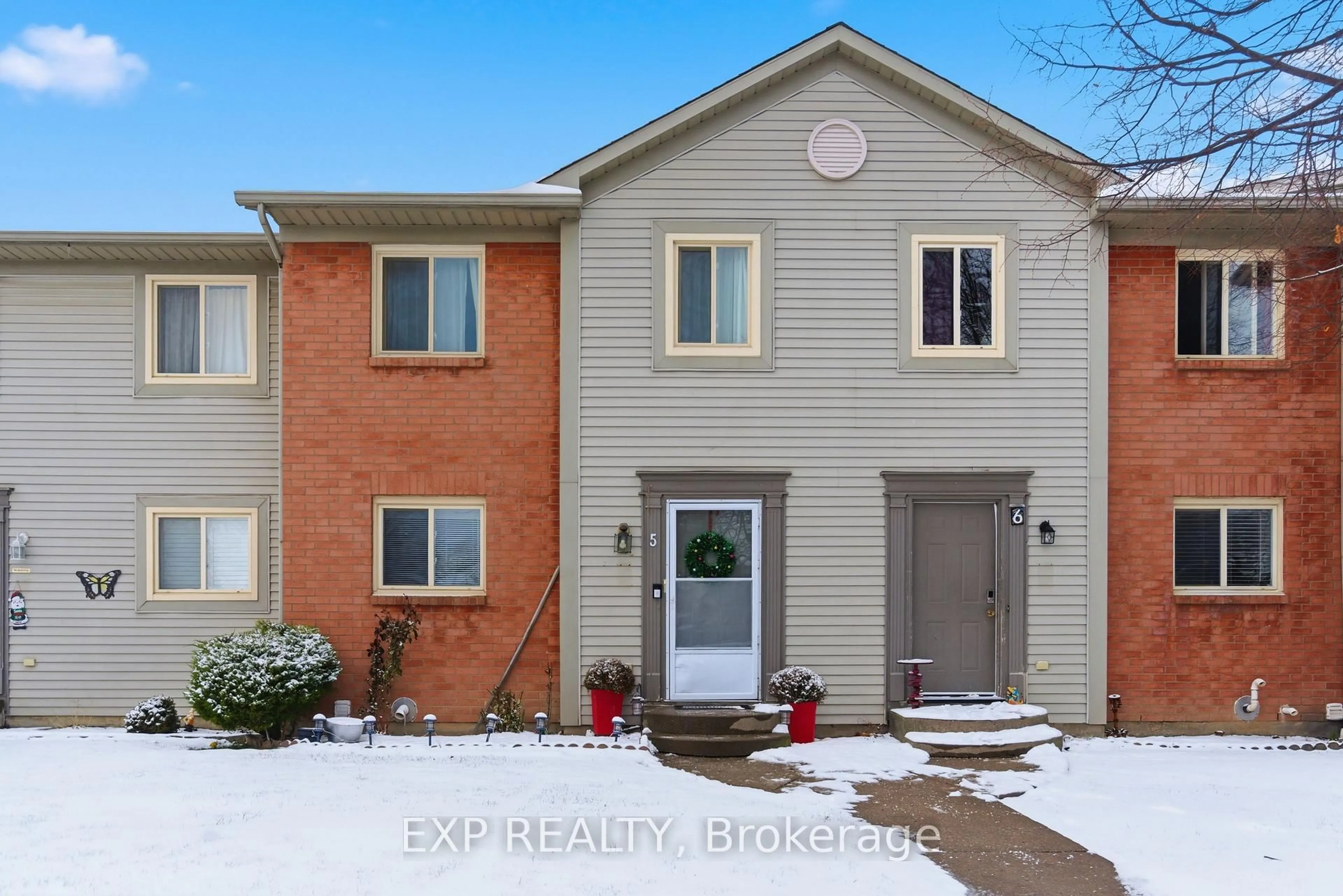 Home with brick exterior material, street for 65 Dorchester Blvd #5, St. Catharines Ontario L2M 7S9