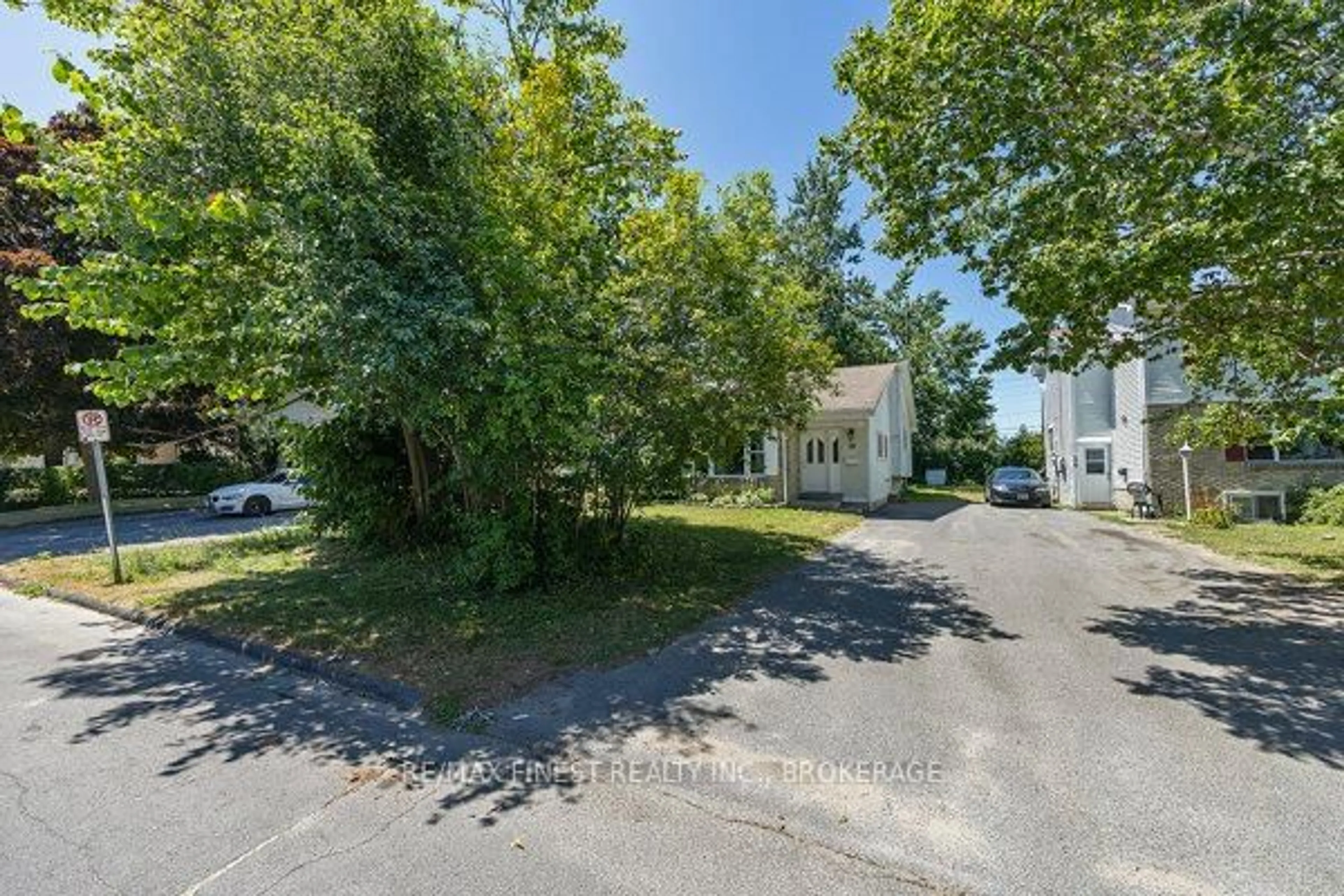 A pic from outside/outdoor area/front of a property/back of a property/a pic from drone, street for 30 Woodstone Cres, Kingston Ontario K7M 6K9