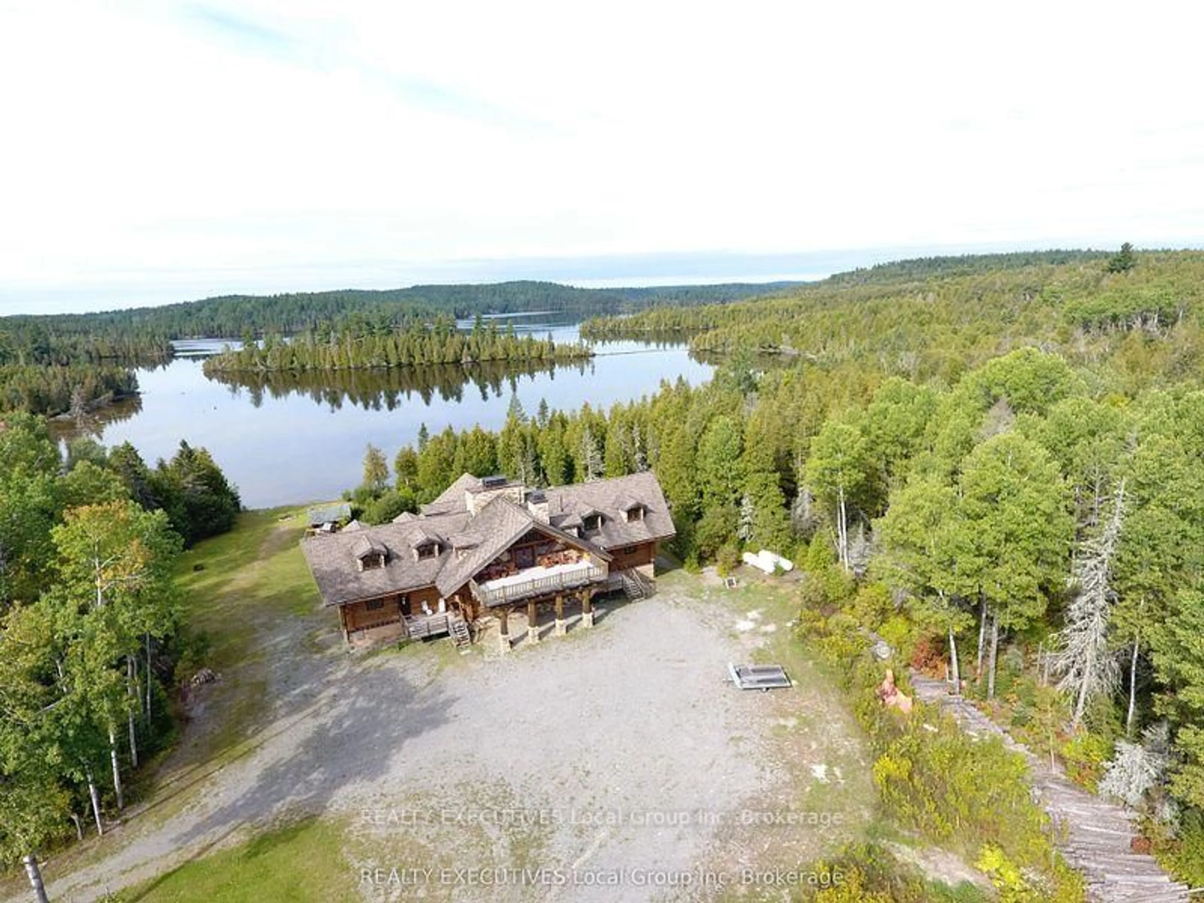 A pic from outside/outdoor area/front of a property/back of a property/a pic from drone, water/lake/river/ocean view for 240/250 KANICHEE MINE Rd, Temagami Ontario P0H 2H0