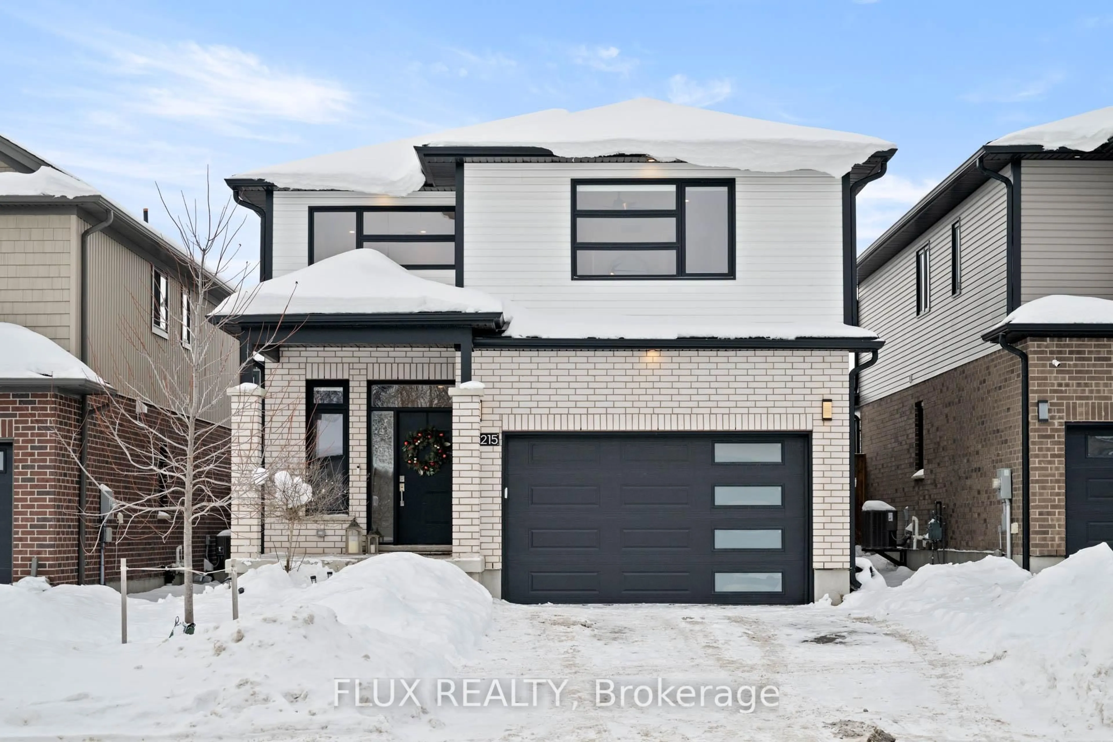 Home with brick exterior material, street for 215 Timber Trail Rd, Waterloo Ontario N3B 0C5