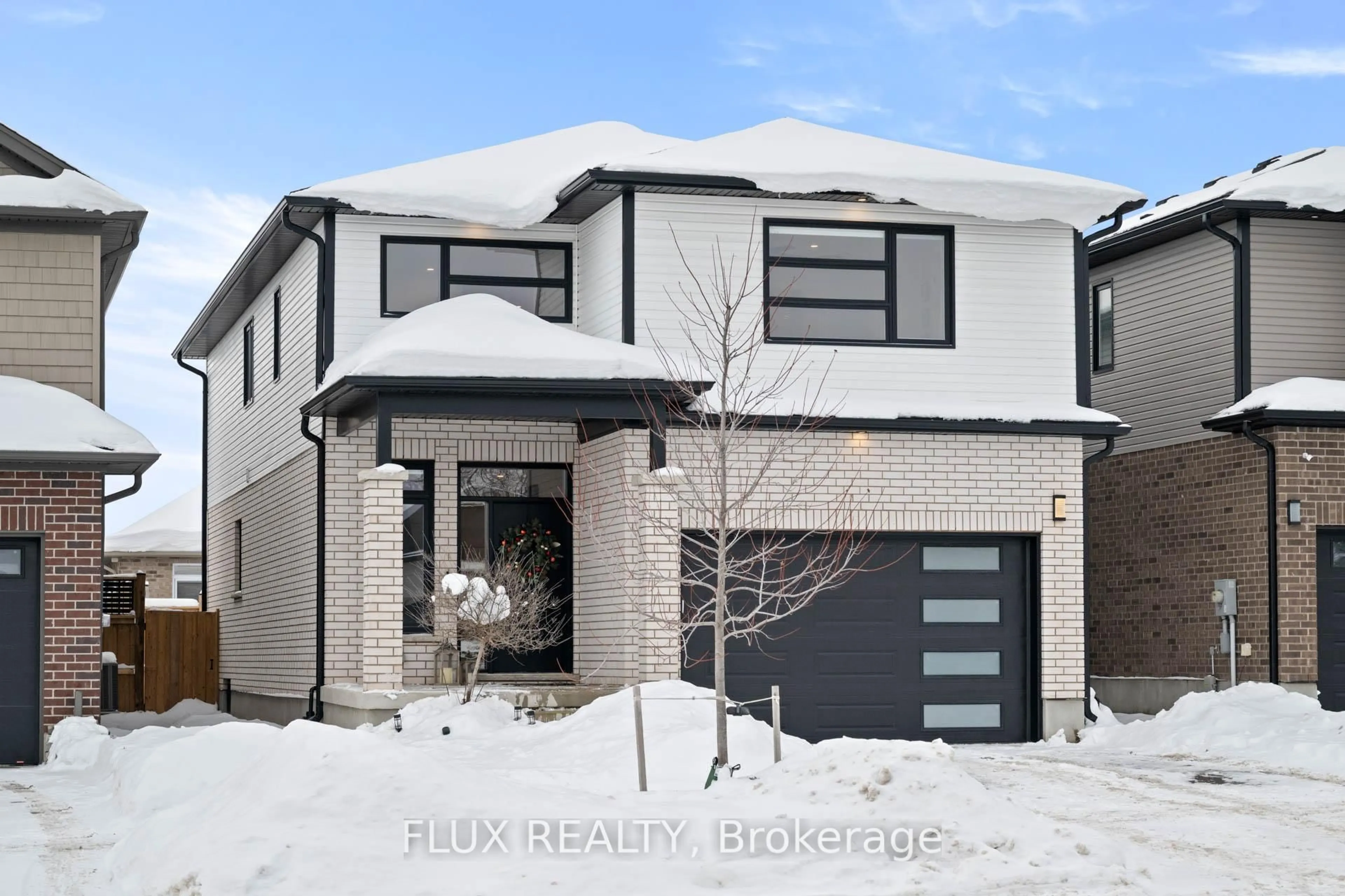 Home with brick exterior material, street for 215 Timber Trail Rd, Waterloo Ontario N3B 0C5