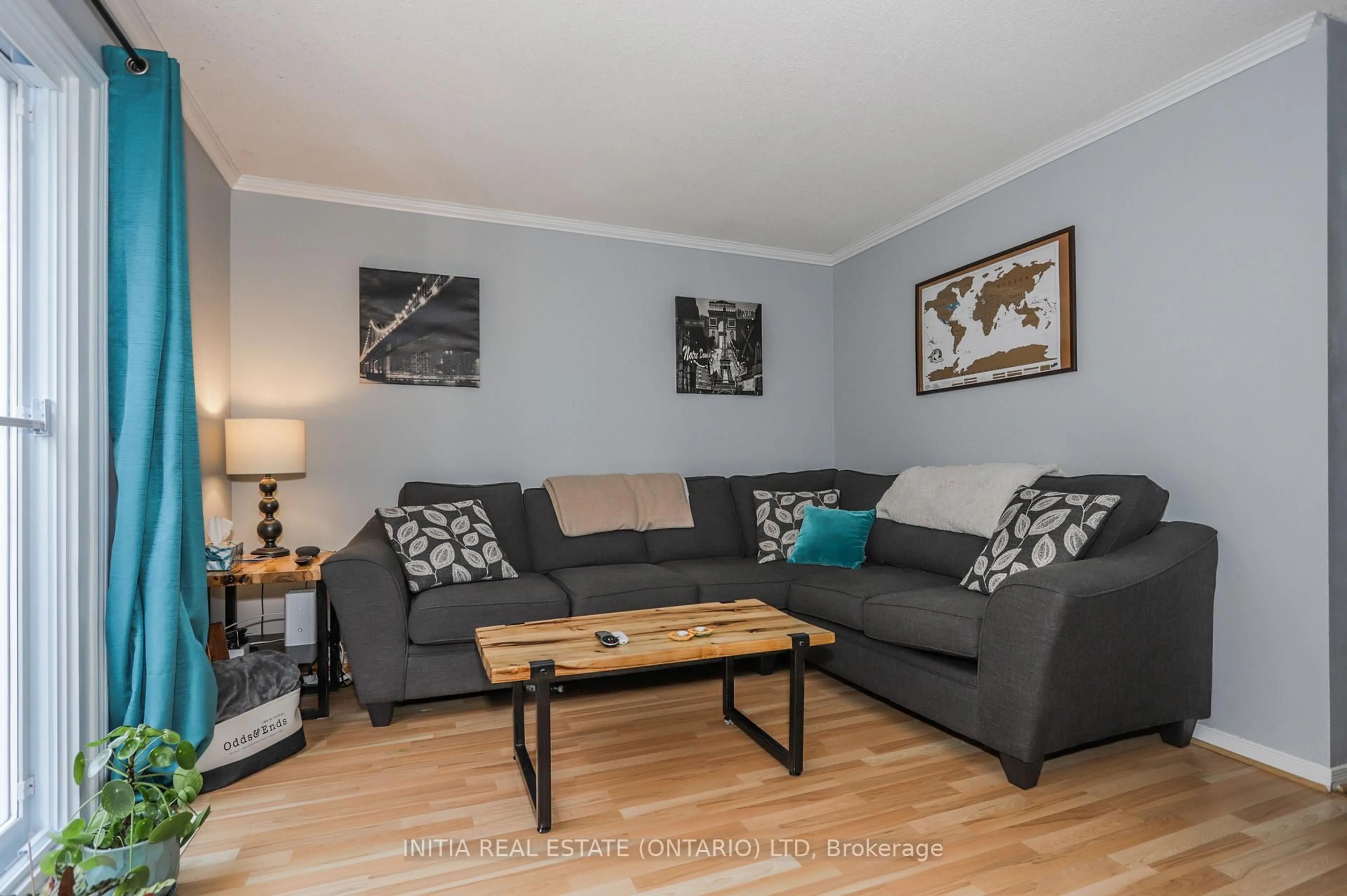 Living room with furniture, wood/laminate floor for 1247 Huron St #91, London East Ontario N5Y 4X7