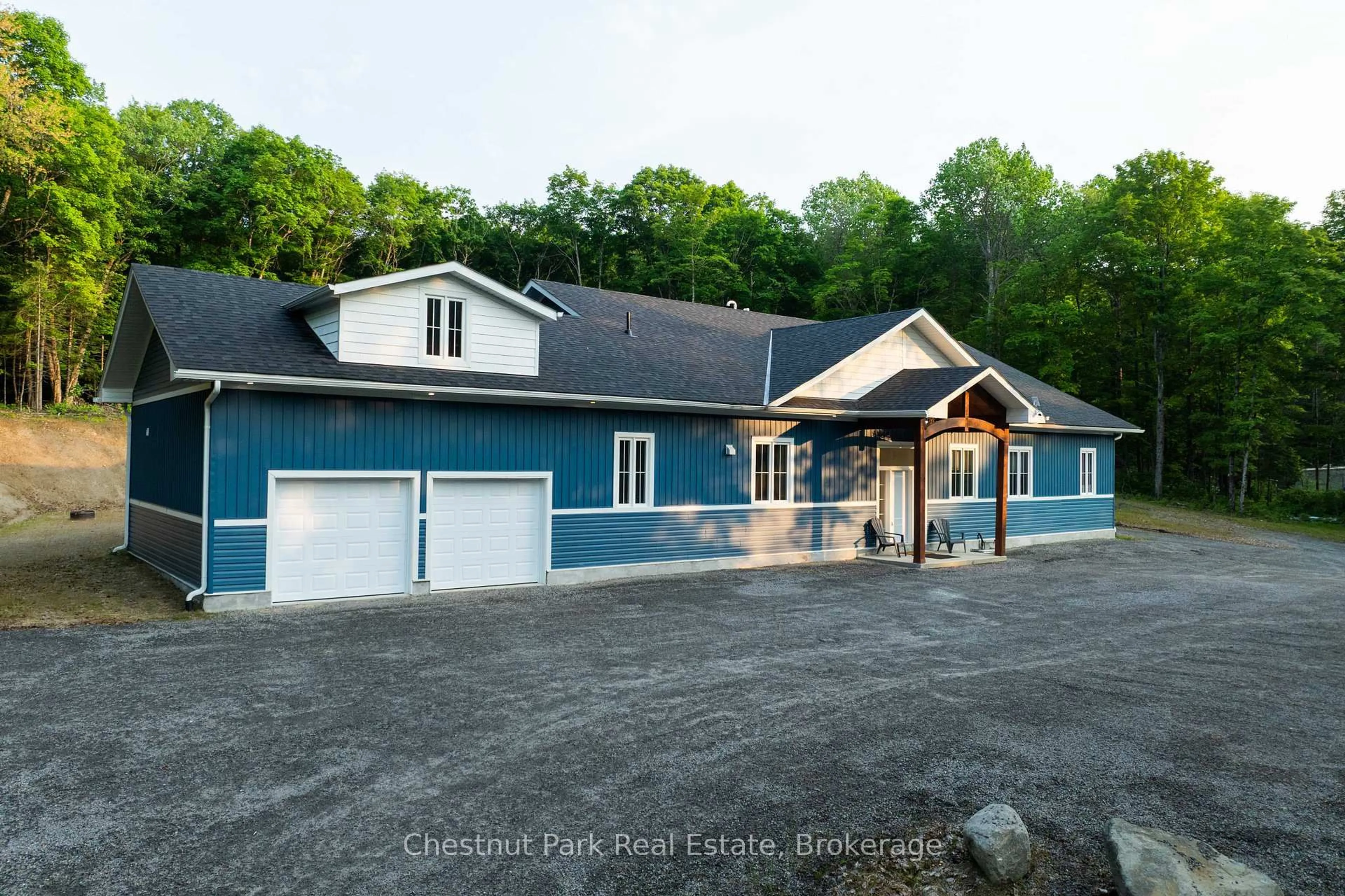 A pic from outside/outdoor area/front of a property/back of a property/a pic from drone, water/lake/river/ocean view for 1153 Deer Lake Rd, Perry Ontario P0A 1Z0