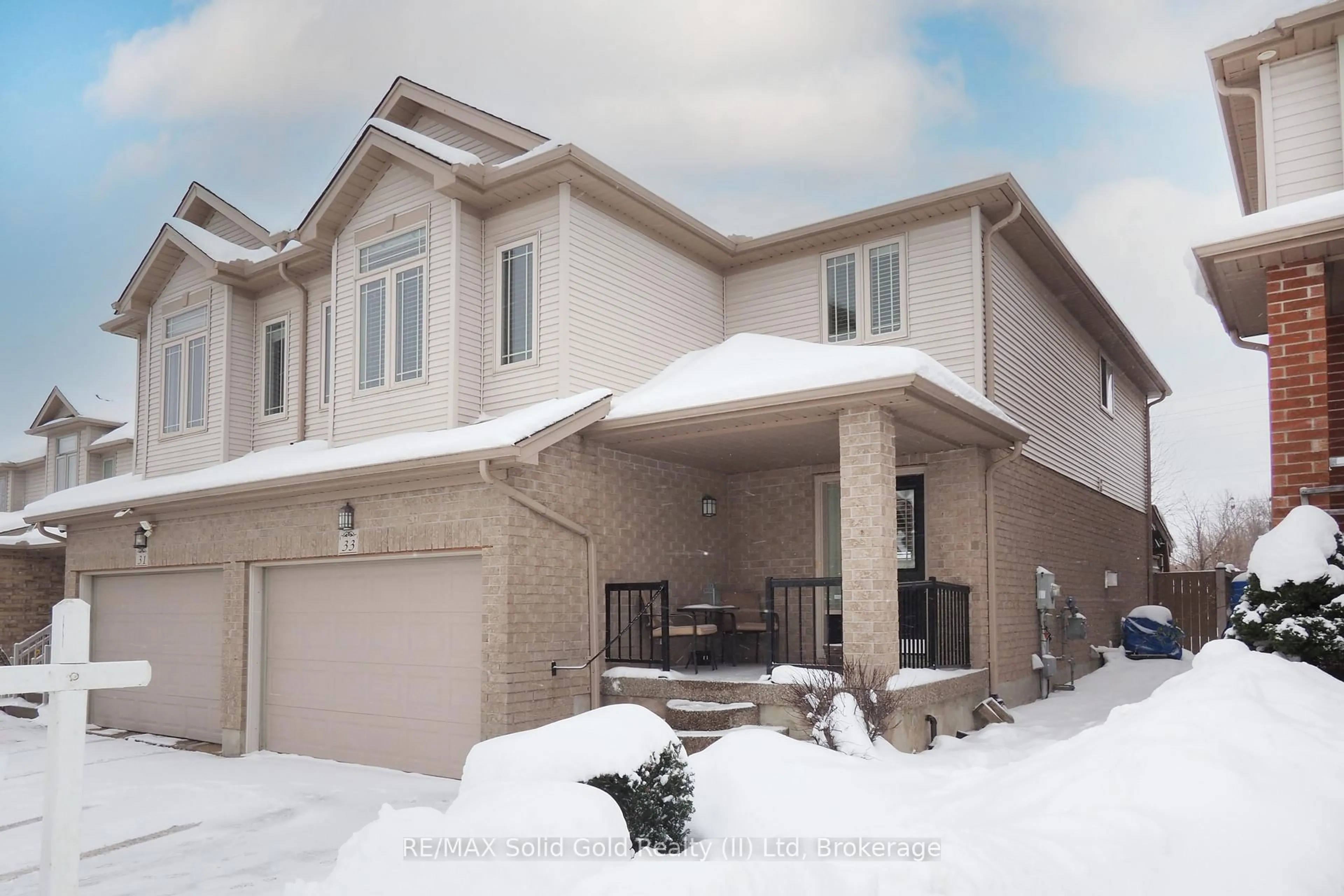 Home with brick exterior material, street for 33 Huck Cres, Kitchener Ontario N2N 3N8