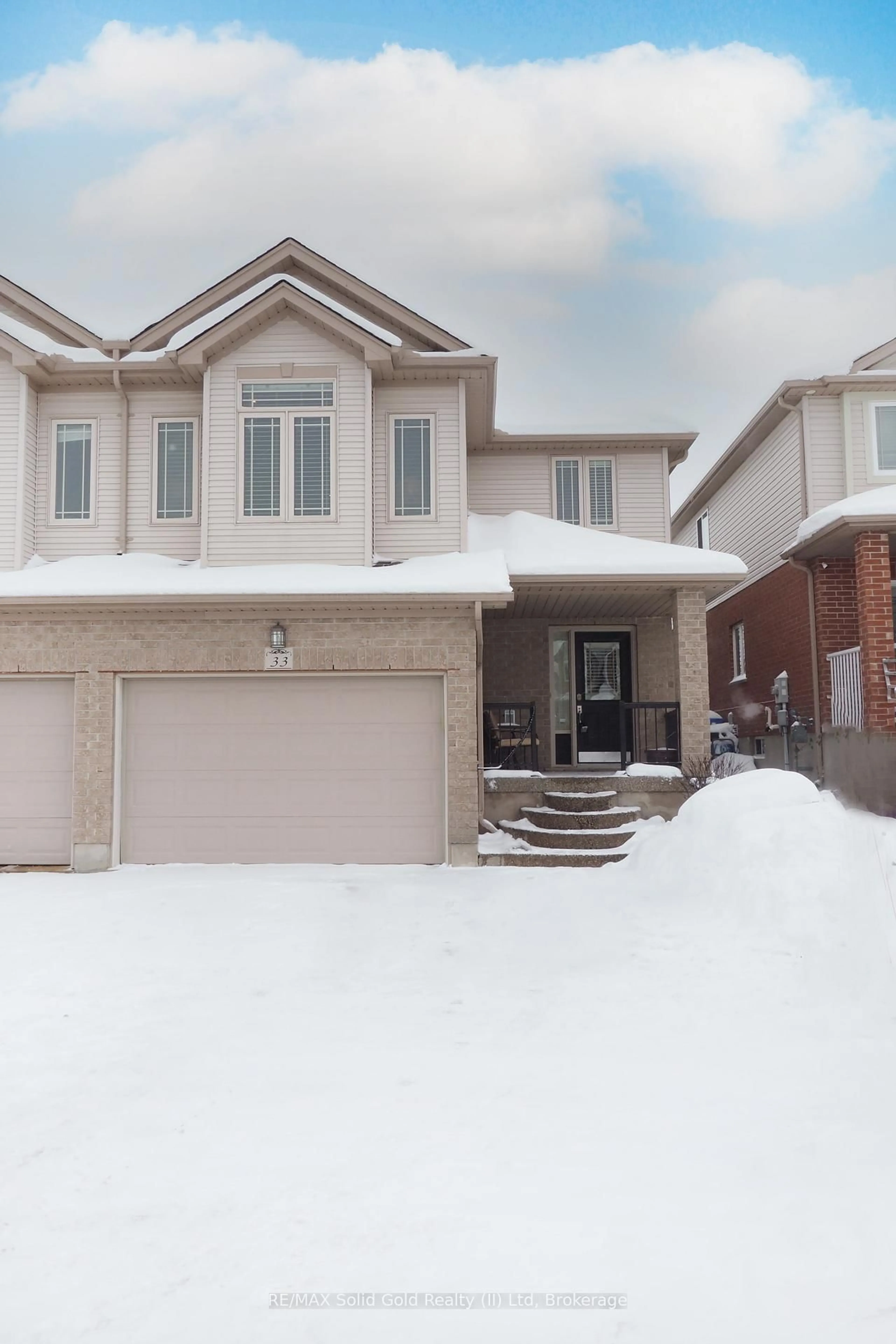 Home with brick exterior material, street for 33 Huck Cres, Kitchener Ontario N2N 3N8