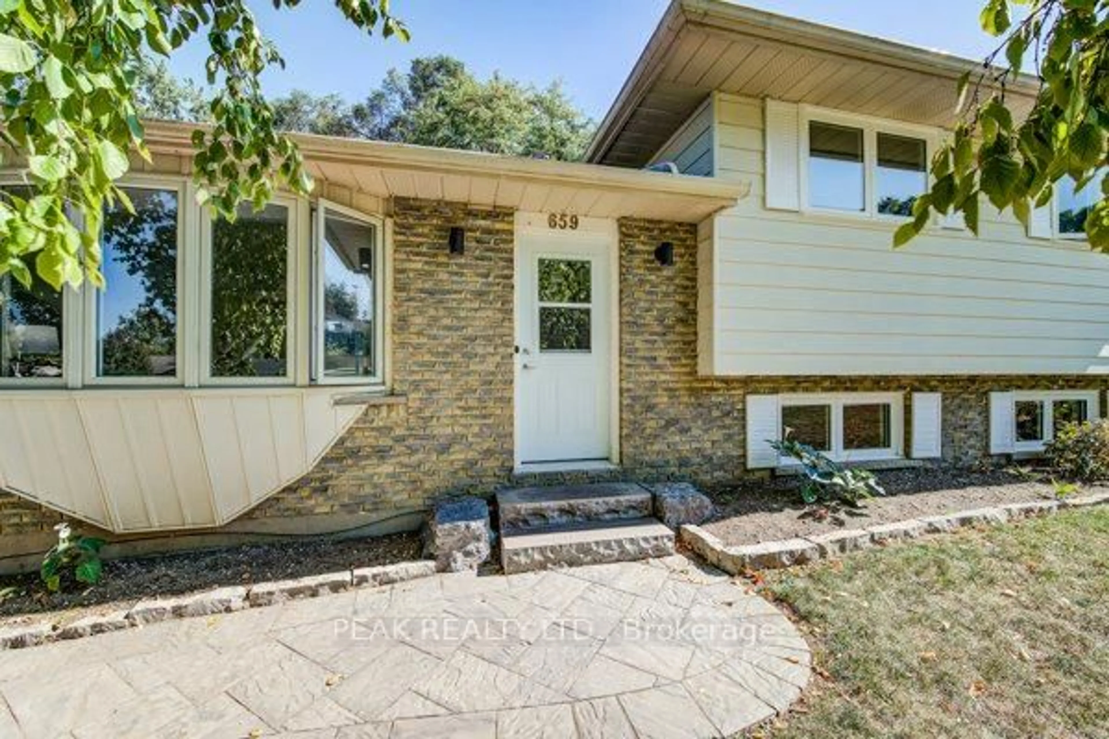 Home with brick exterior material, street for 659 Gladstone Dr, Woodstock Ontario N4S 5S7