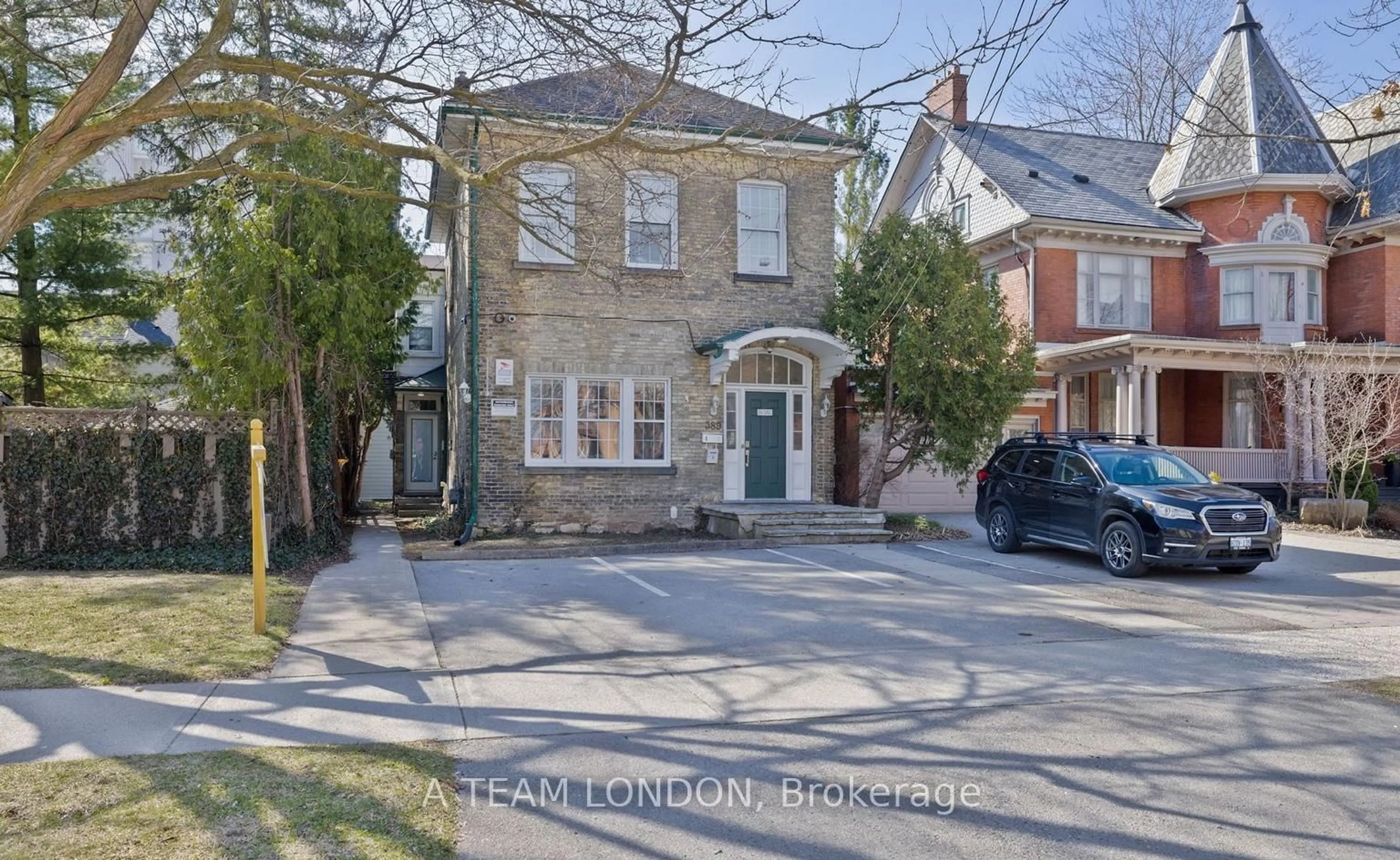 Home with brick exterior material, street for 389 Dufferin Ave, London East Ontario N6B 1Z5