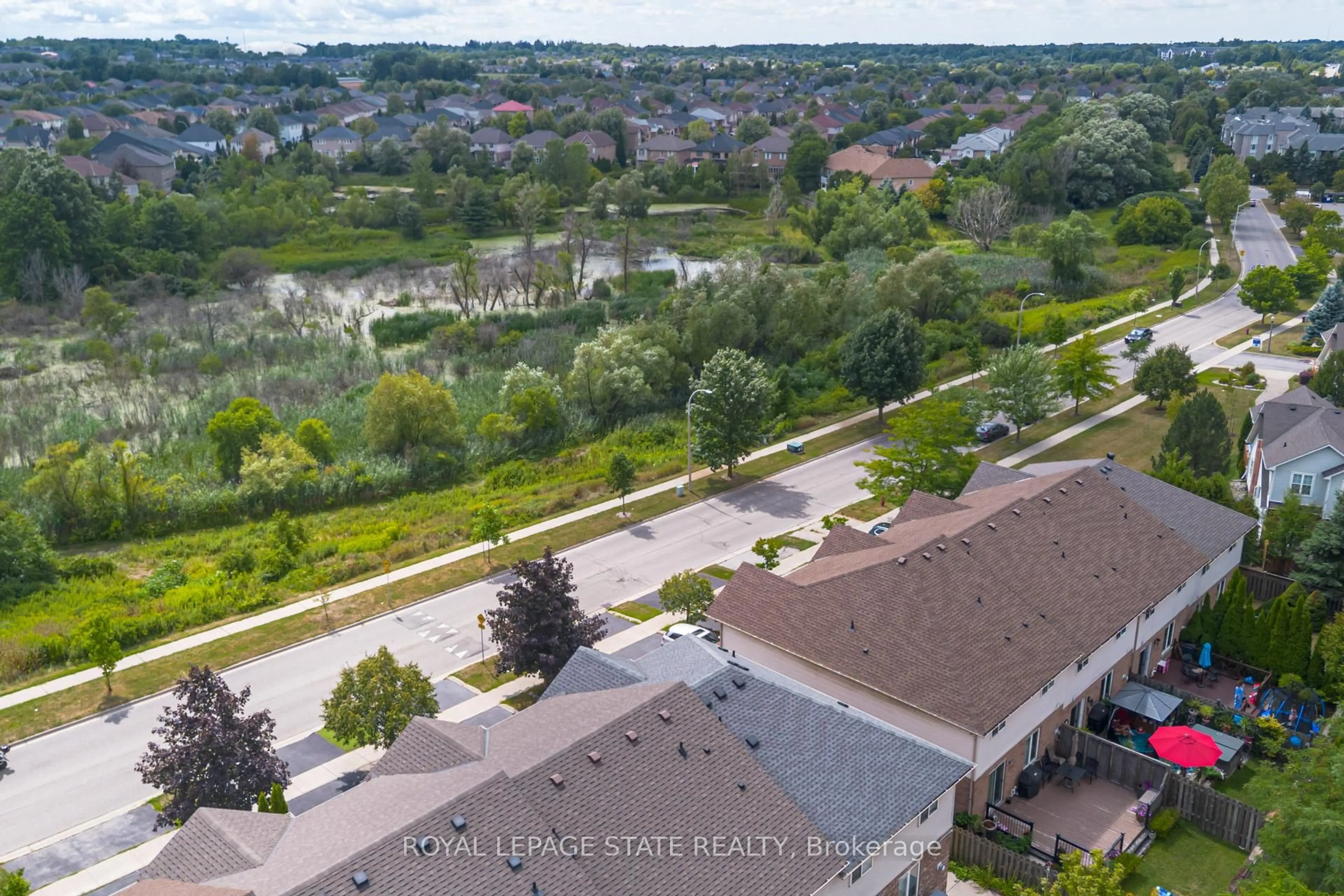 A pic from outside/outdoor area/front of a property/back of a property/a pic from drone, water/lake/river/ocean view for 1105 Harrogate Dr, Hamilton Ontario L9K 1N1