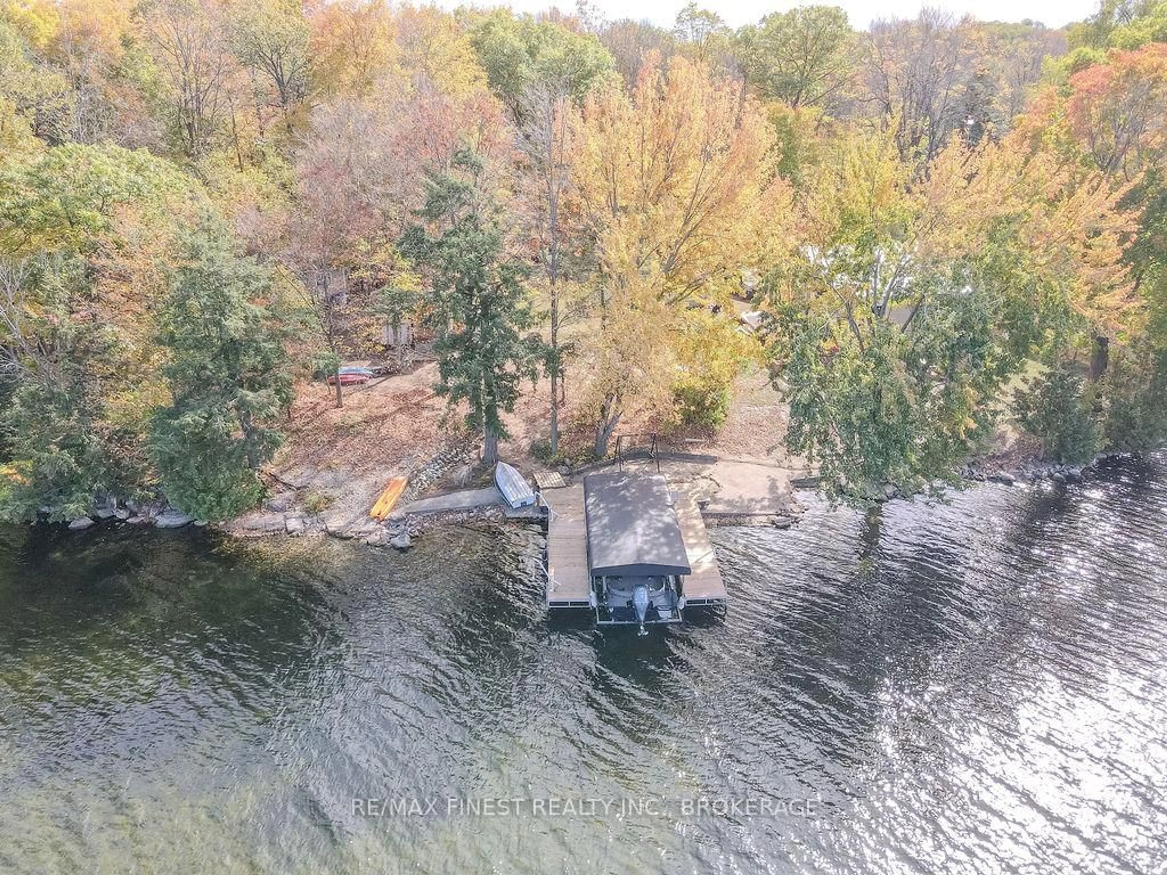 A pic from outside/outdoor area/front of a property/back of a property/a pic from drone, water/lake/river/ocean view for 1127 Perry Lane, Sydenham Ontario K0H 2T0