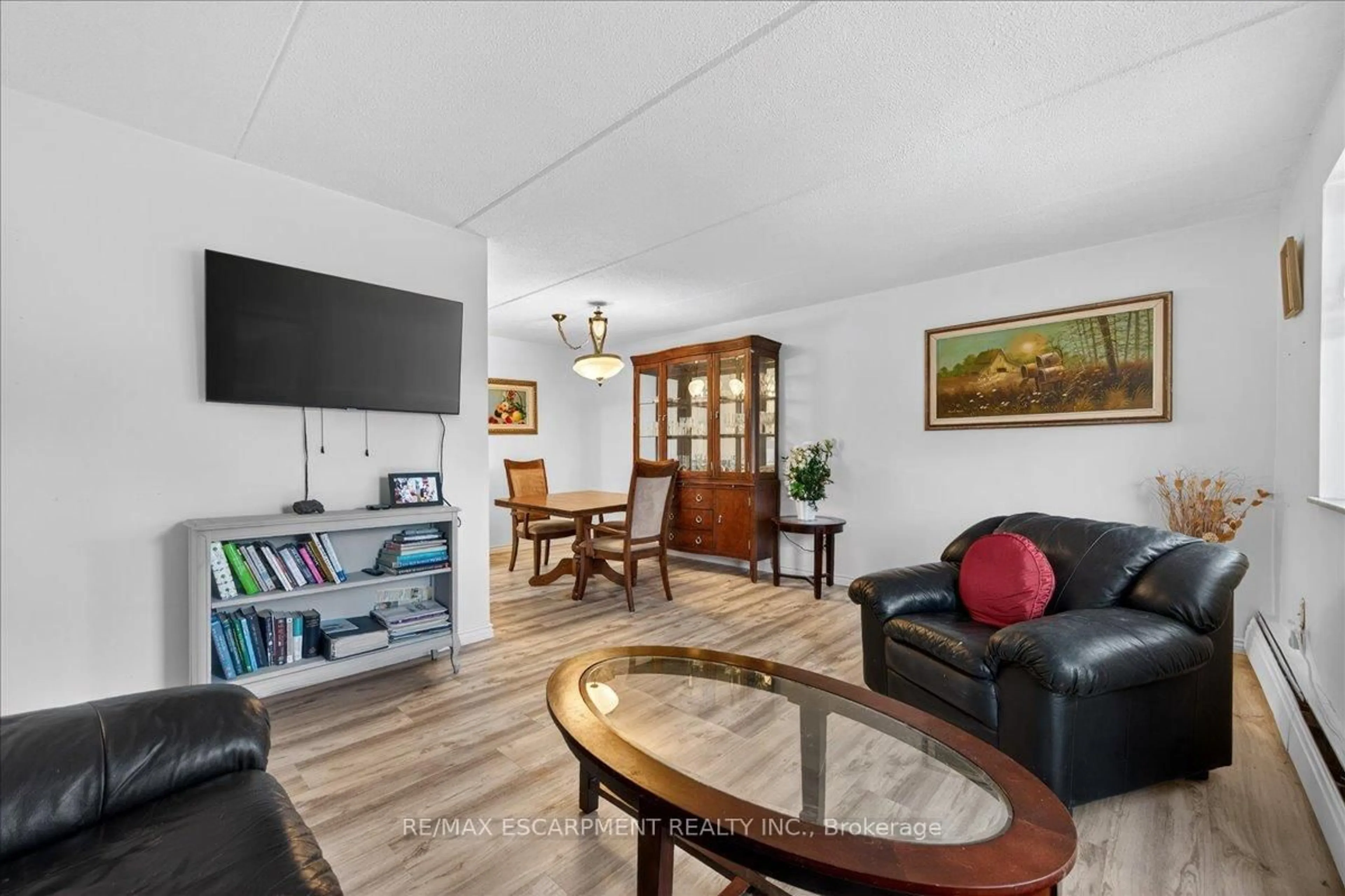 Living room with furniture, unknown for 198 Scott St #417, St. Catharines Ontario L2N 5T3