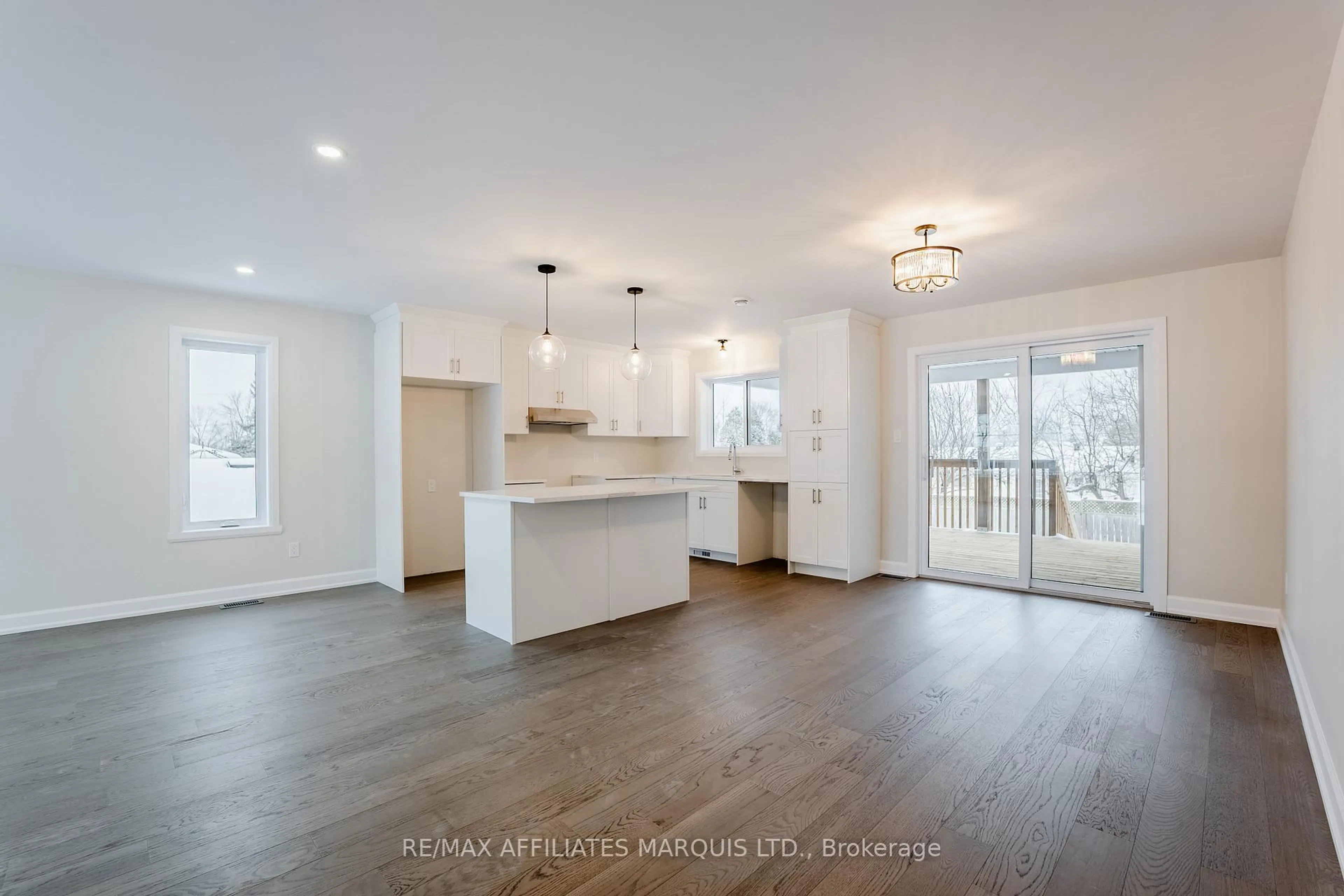 Open concept kitchen, wood/laminate floor for 209 Ruby Dr, Cornwall Ontario K6H 0H2