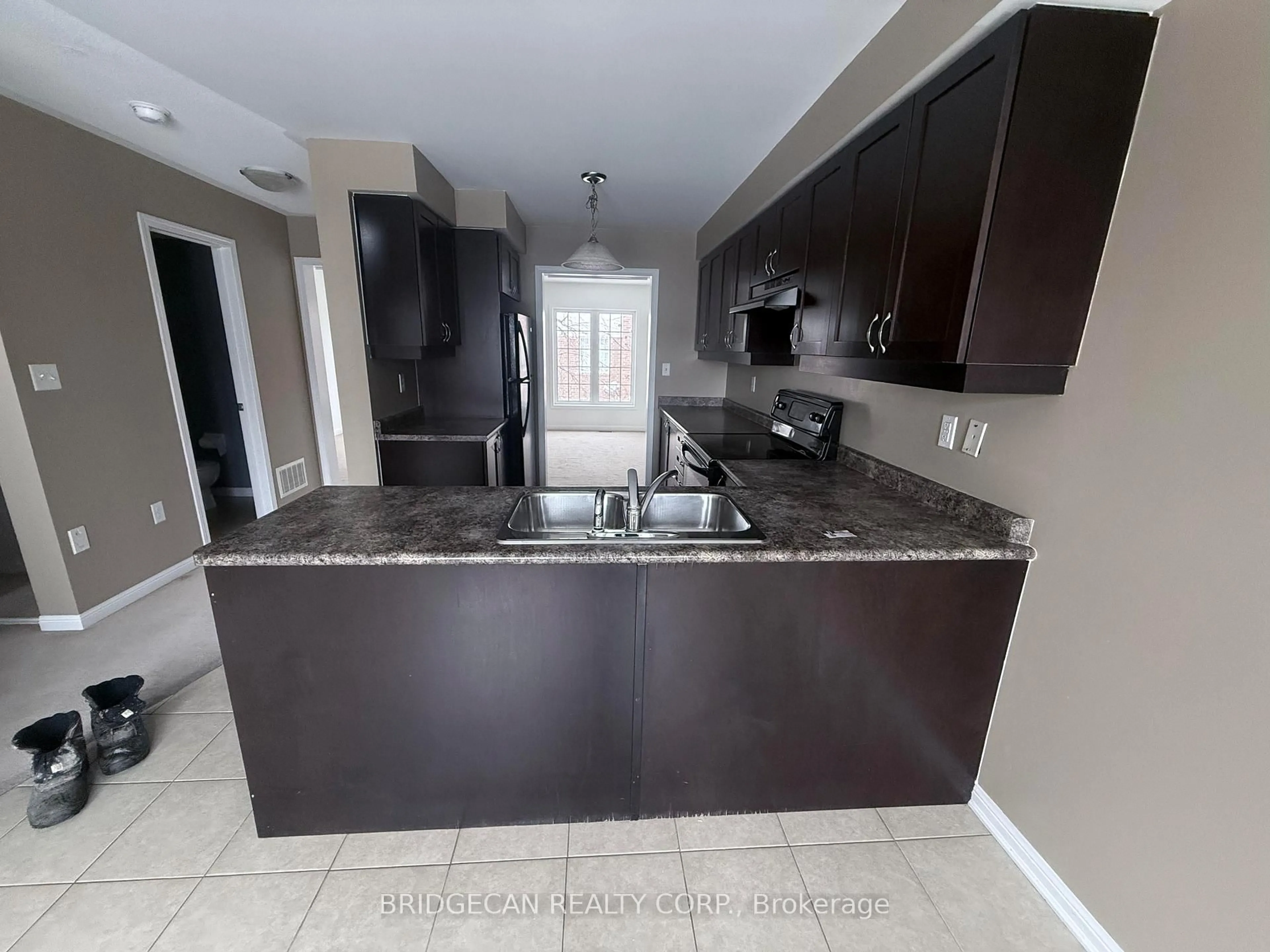 Open concept kitchen, ceramic/tile floor for 50 Emick Dr, Hamilton Ontario L9K 0C6