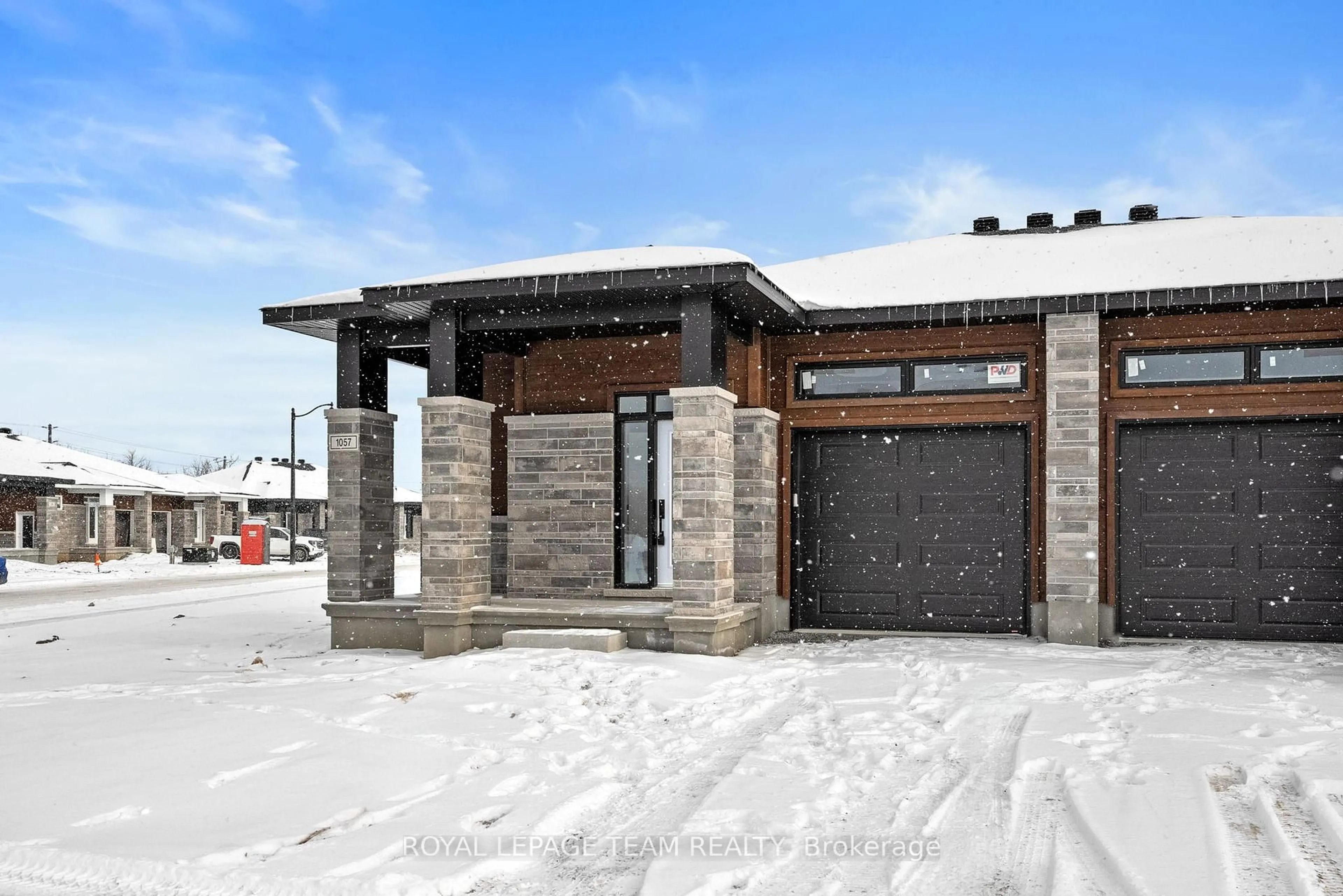 Home with brick exterior material, street for 1057 Moore St, Brockville Ontario K6V 0H1