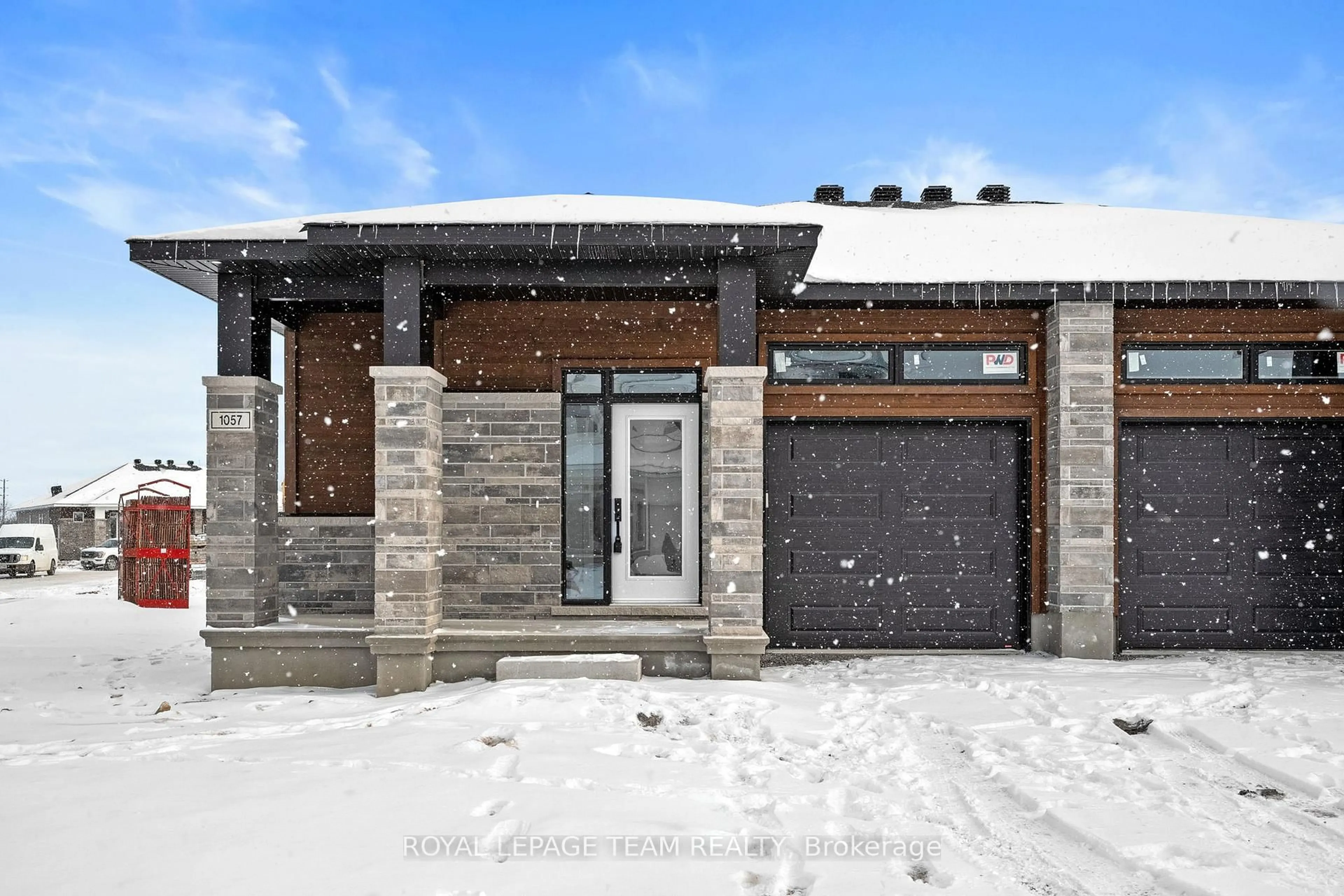 Home with brick exterior material, street for 1057 Moore St, Brockville Ontario K6V 0H1