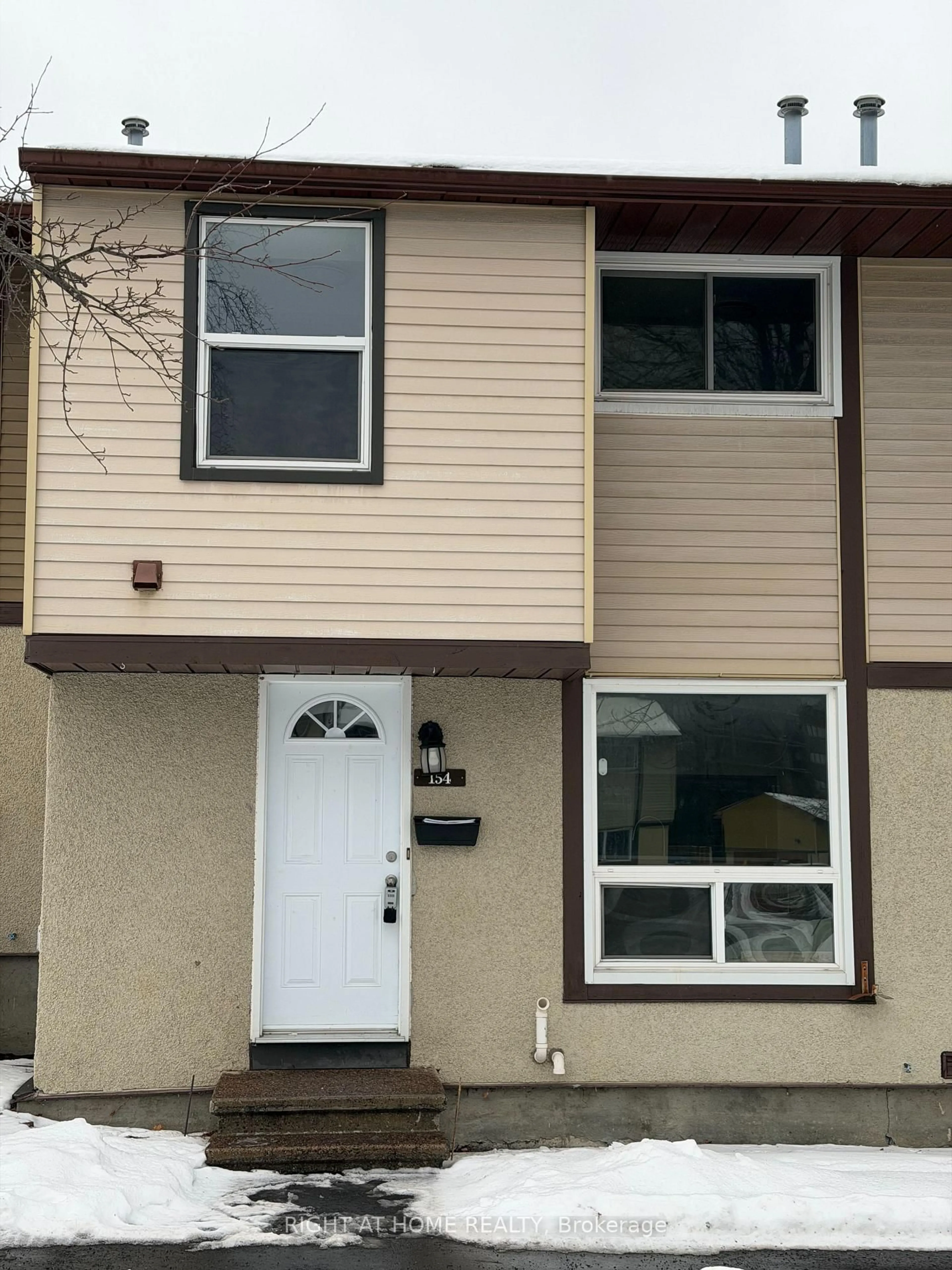 Home with vinyl exterior material, street for 2570 Southvale Cres #154, Ottawa Ontario K1B 5B6