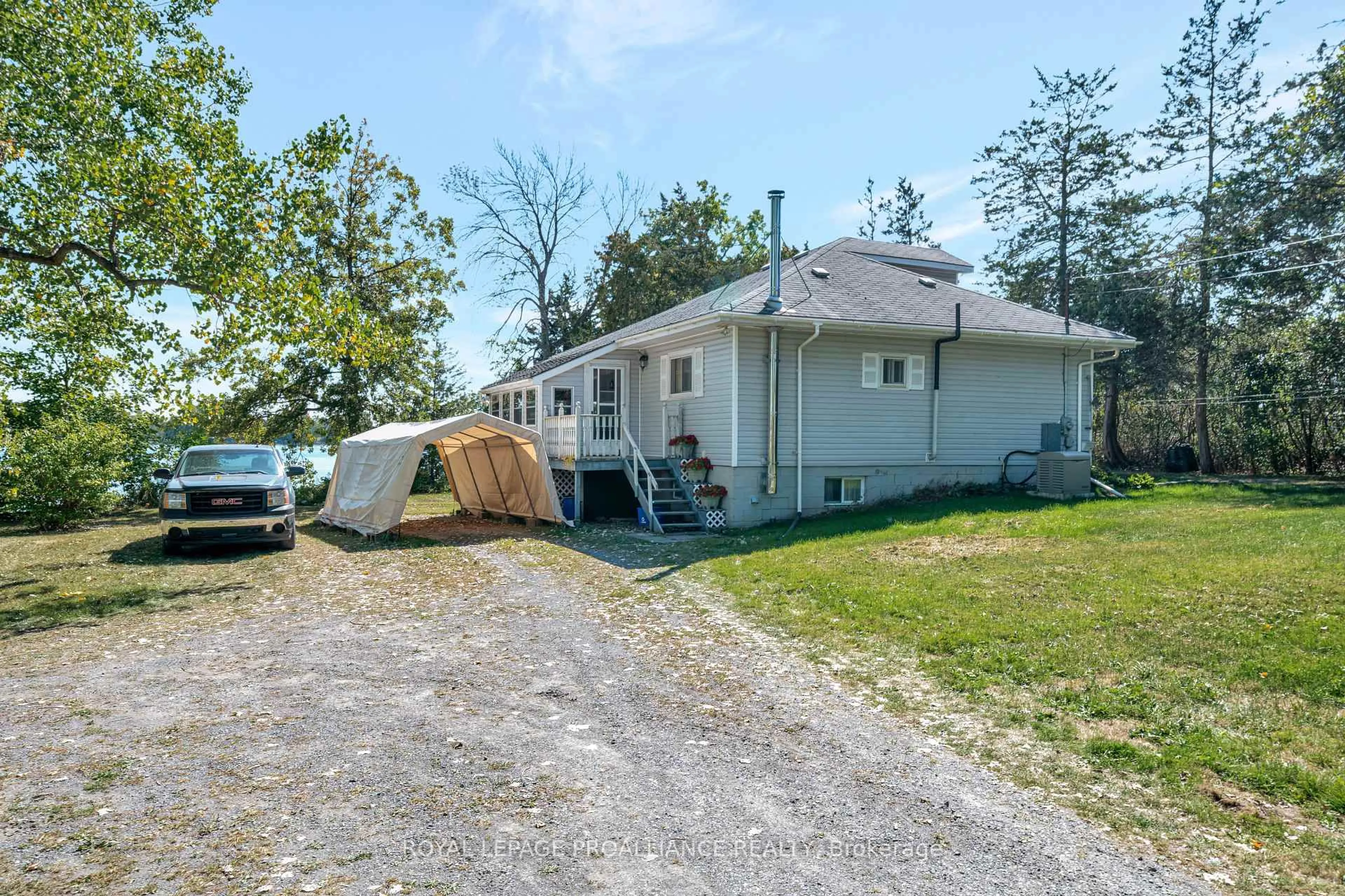 A pic from outside/outdoor area/front of a property/back of a property/a pic from drone, street for 473 County Rd 19, Prince Edward County Ontario K0K 1A0