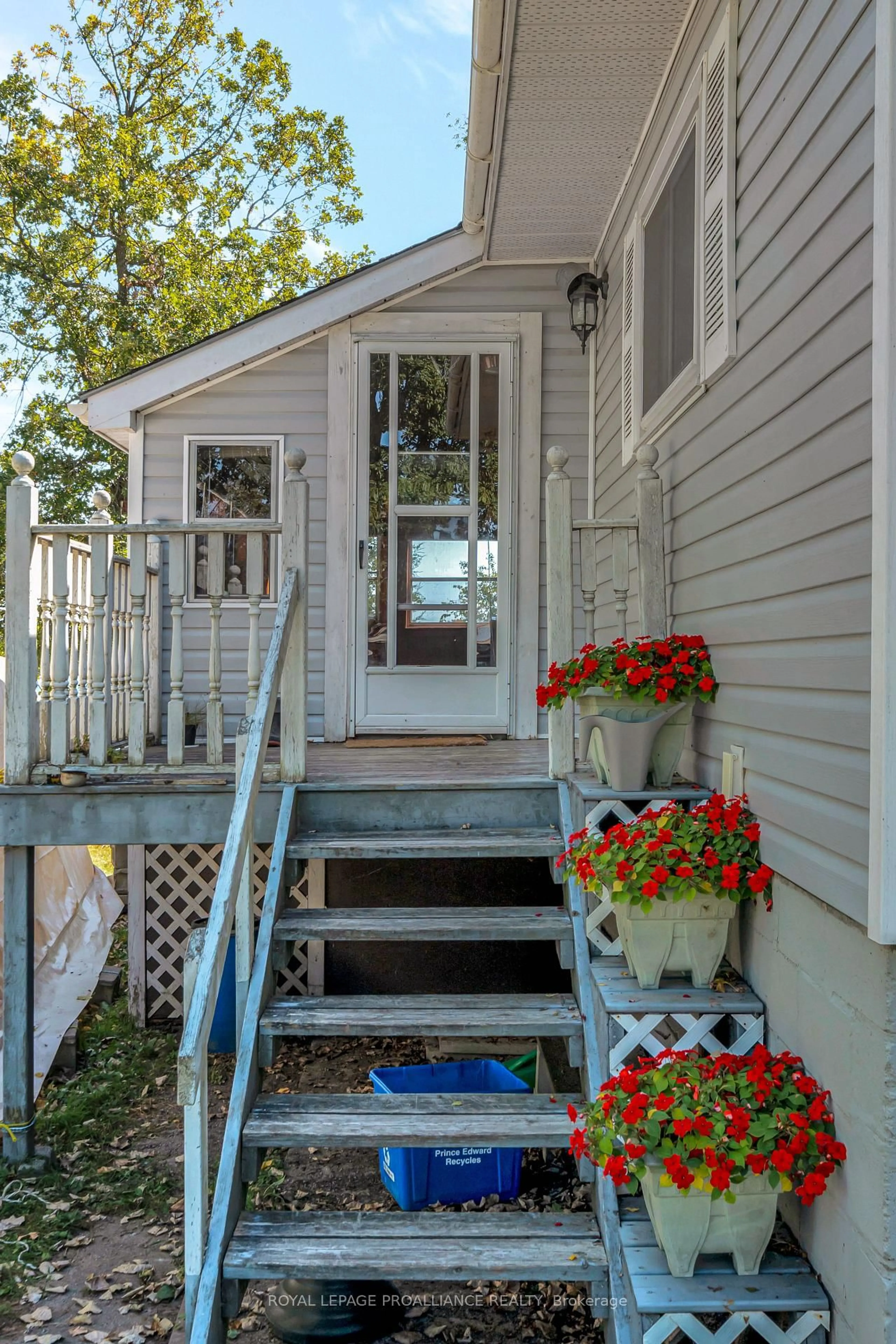 Home with vinyl exterior material, street for 473 County Rd 19, Prince Edward County Ontario K0K 1A0