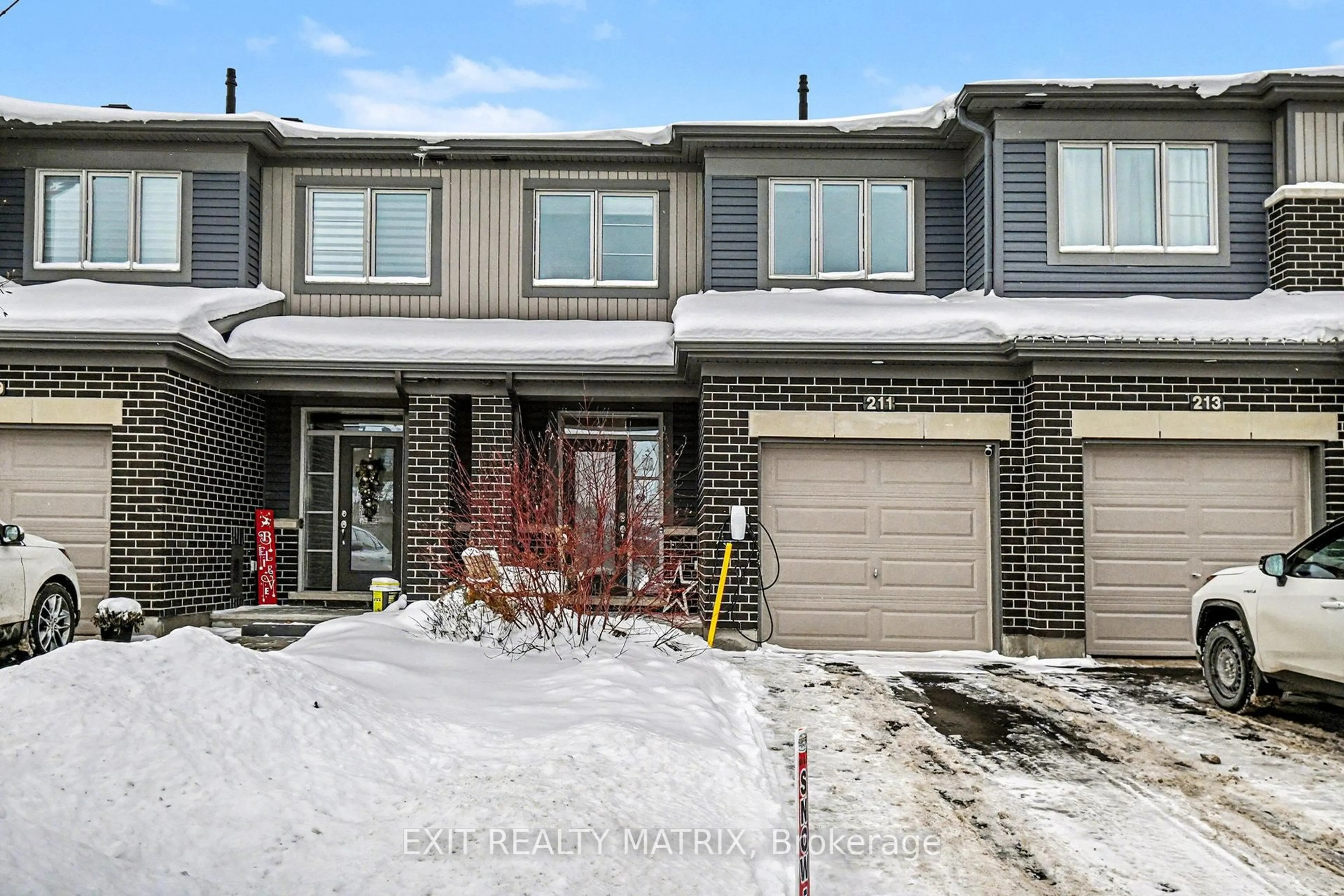 Home with brick exterior material, street for 211 Mountain Sorrel Way, Ottawa Ontario K4A 0T6
