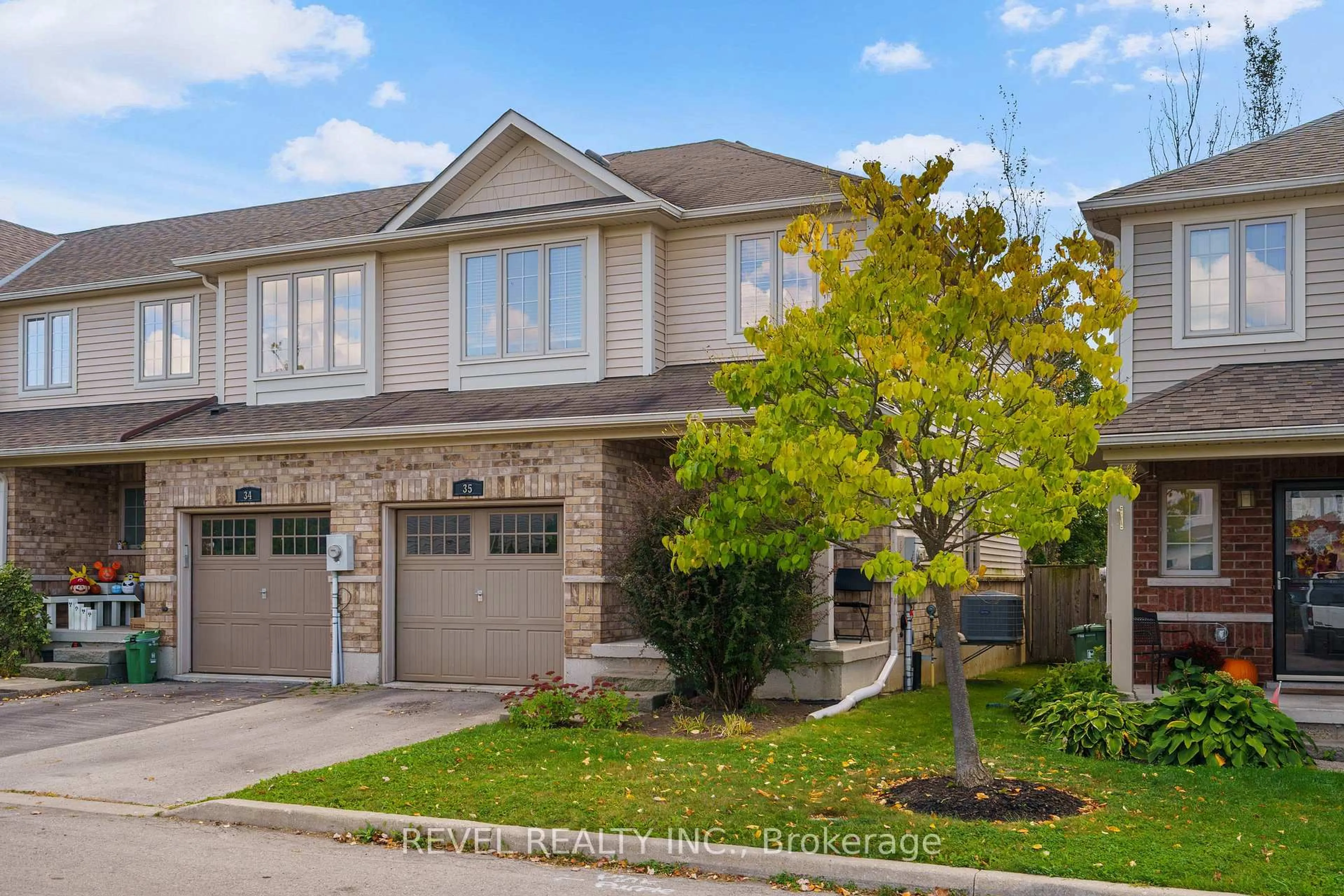 Home with brick exterior material, street for 222 Fall Fair Way #35, Hamilton Ontario L0R 1C0