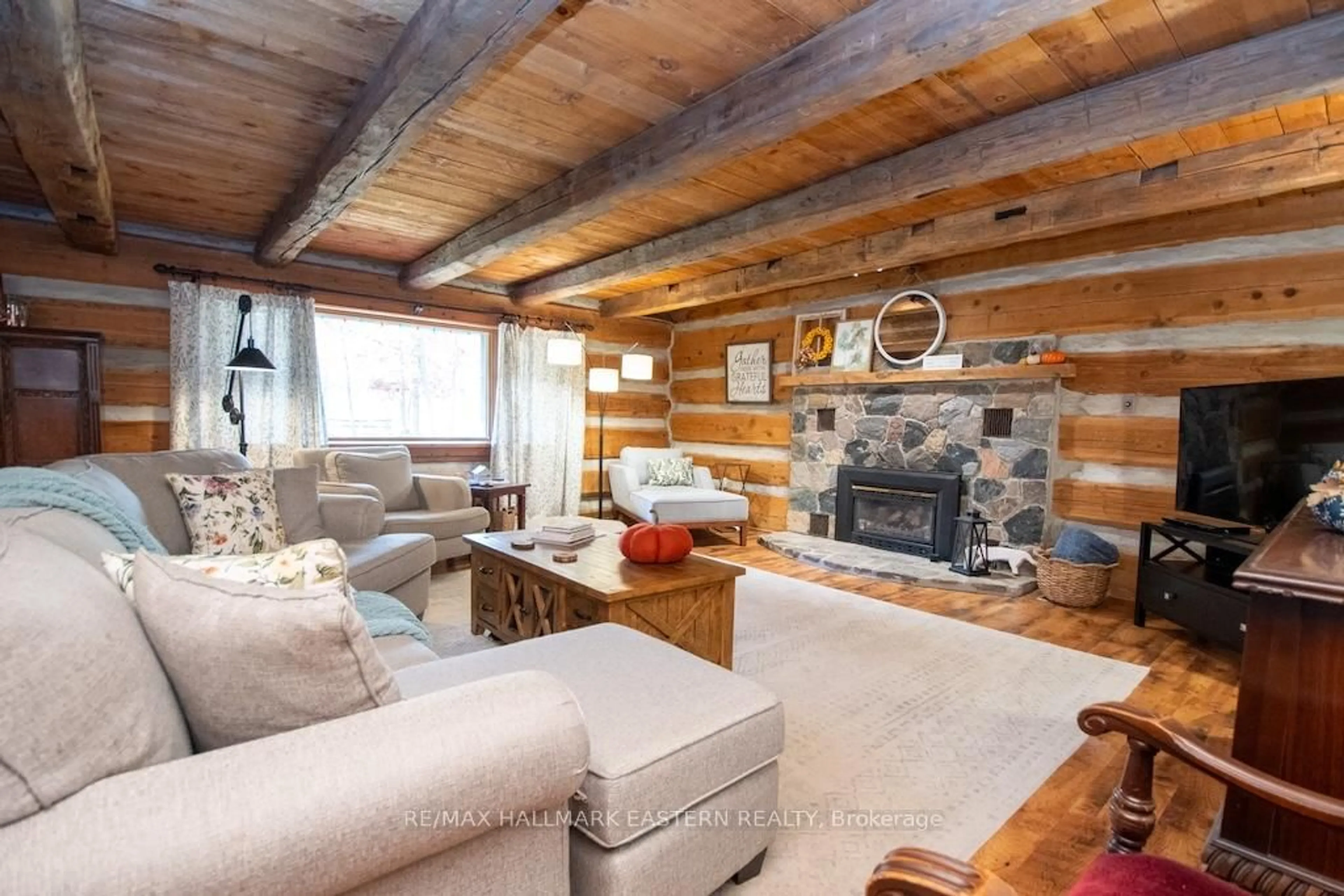 Living room with furniture, wood/laminate floor for 371-B Godolphin Rd, Trent Hills Ontario K0K 3K0