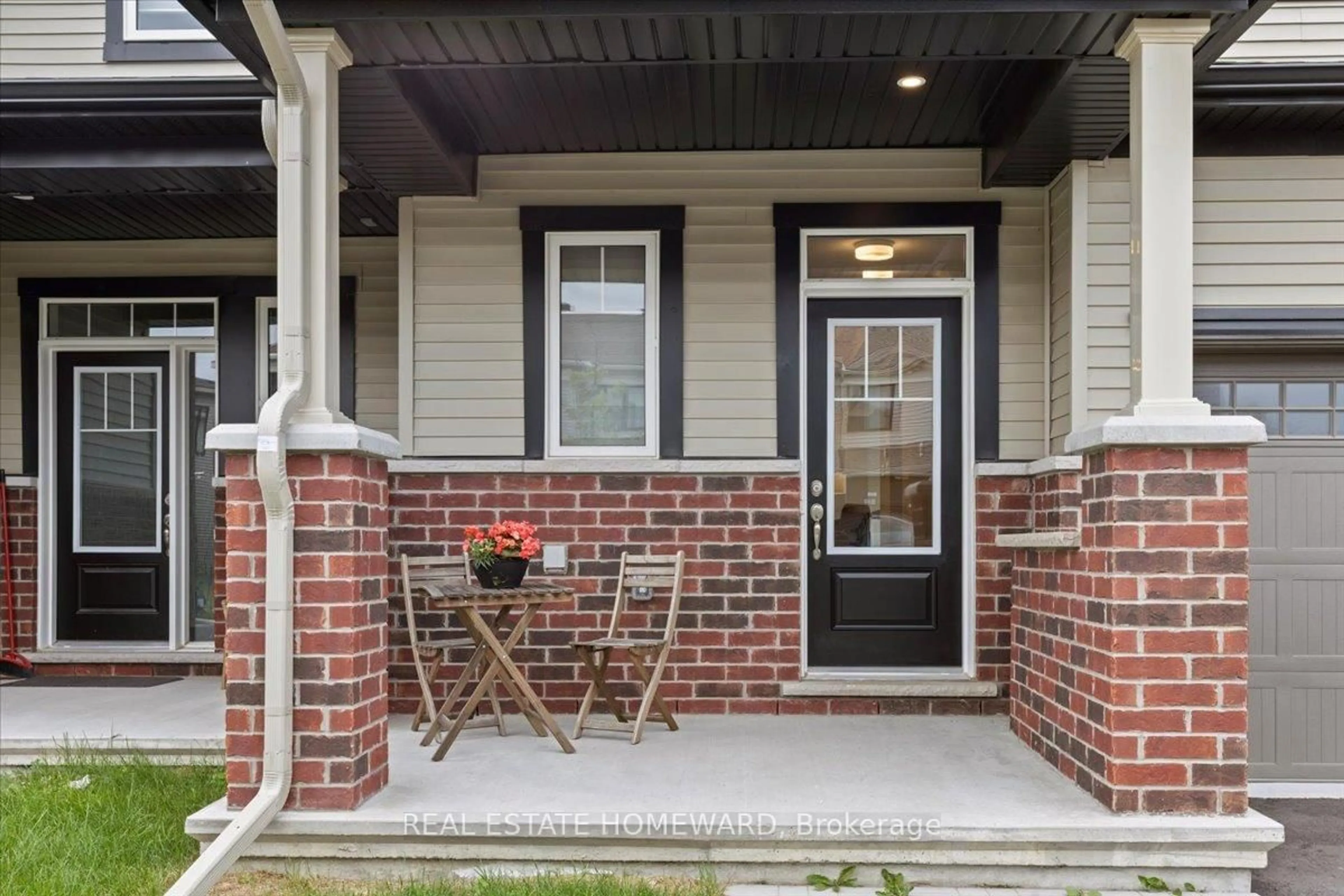 Home with brick exterior material, street for 52 Kindred Row, Ottawa Ontario K2S 3A1