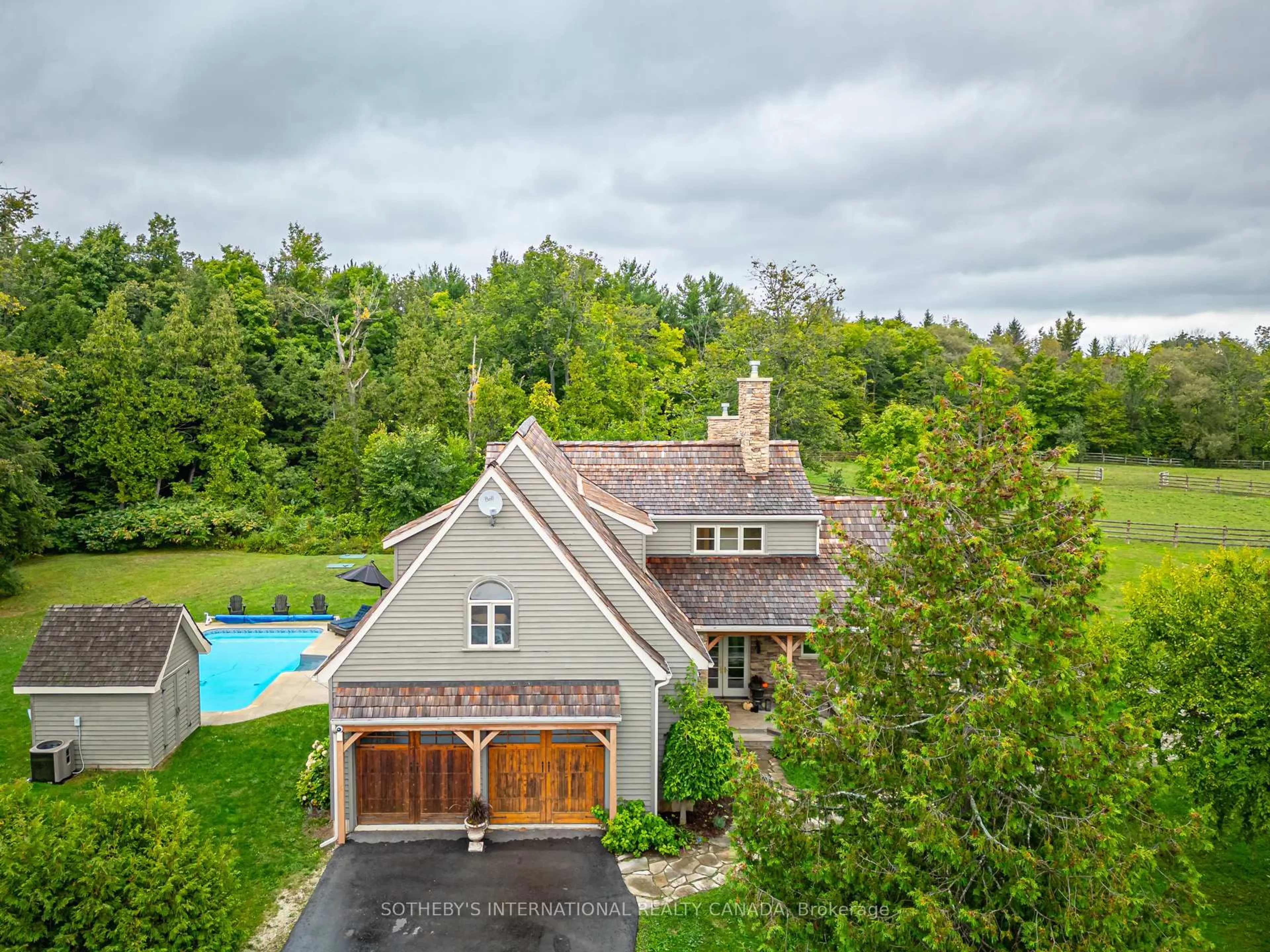 A pic from outside/outdoor area/front of a property/back of a property/a pic from drone, water/lake/river/ocean view for 787517 Grey 13 Rd, Blue Mountains Ontario N0H 2P0