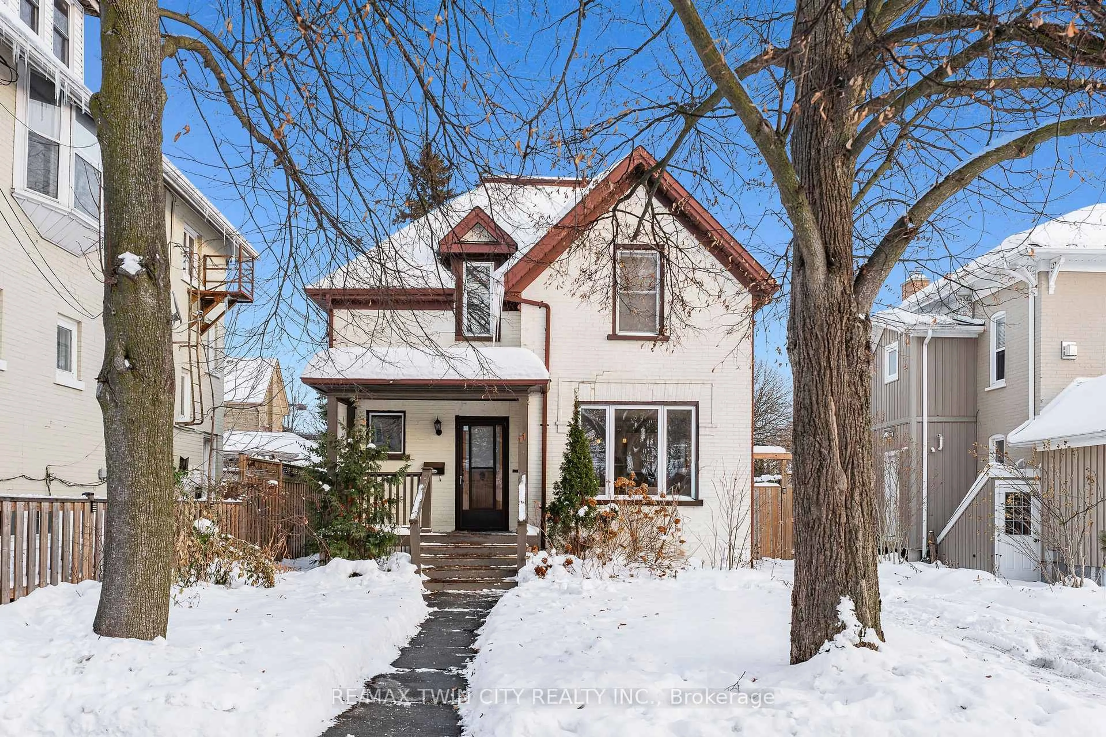 Home with brick exterior material, street for 11 Heins Ave, Kitchener Ontario N2G 1Z7