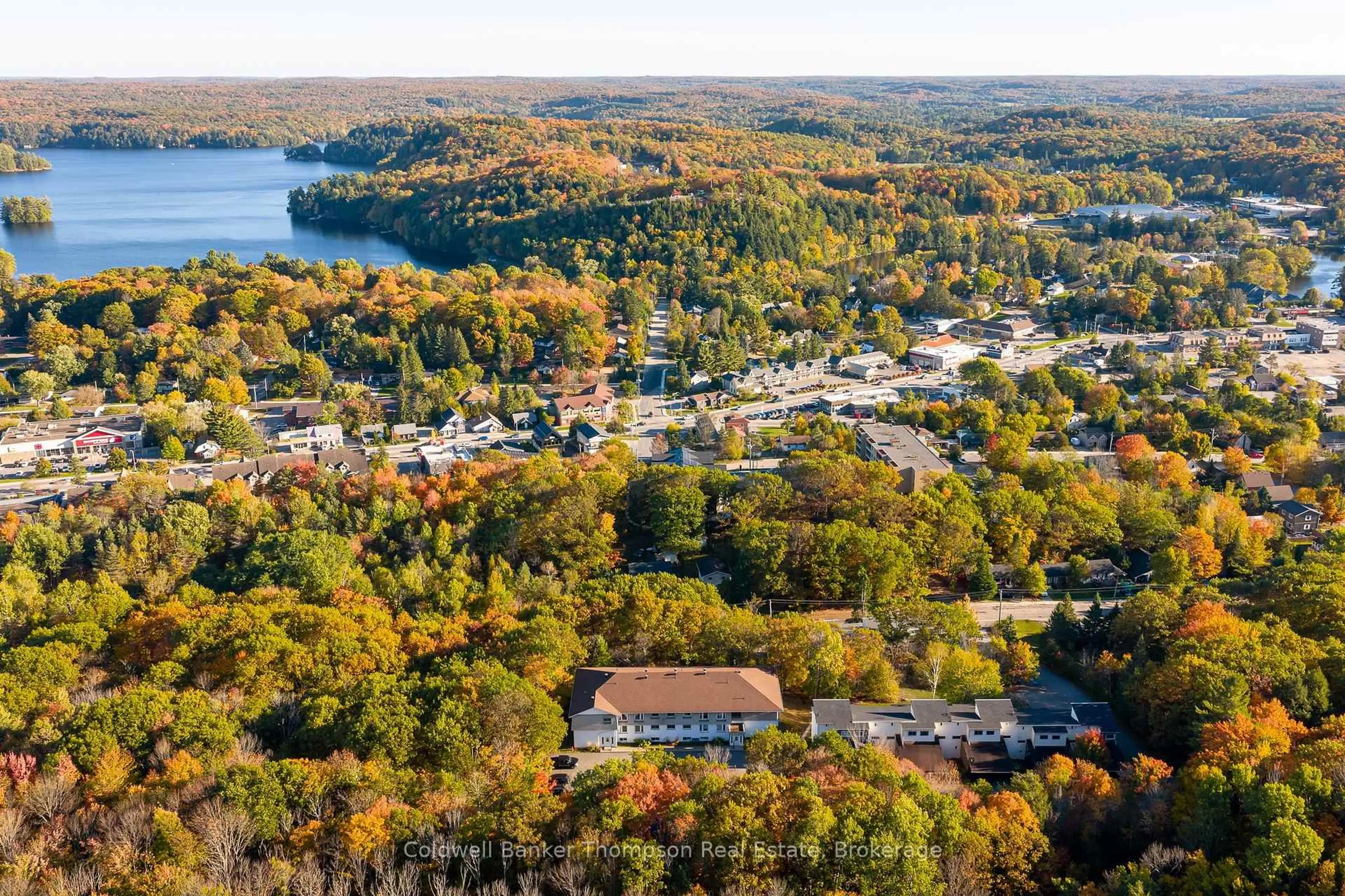 A pic from outside/outdoor area/front of a property/back of a property/a pic from drone, water/lake/river/ocean view for 26 Herman Ave #22, Huntsville Ontario P1H 1J6