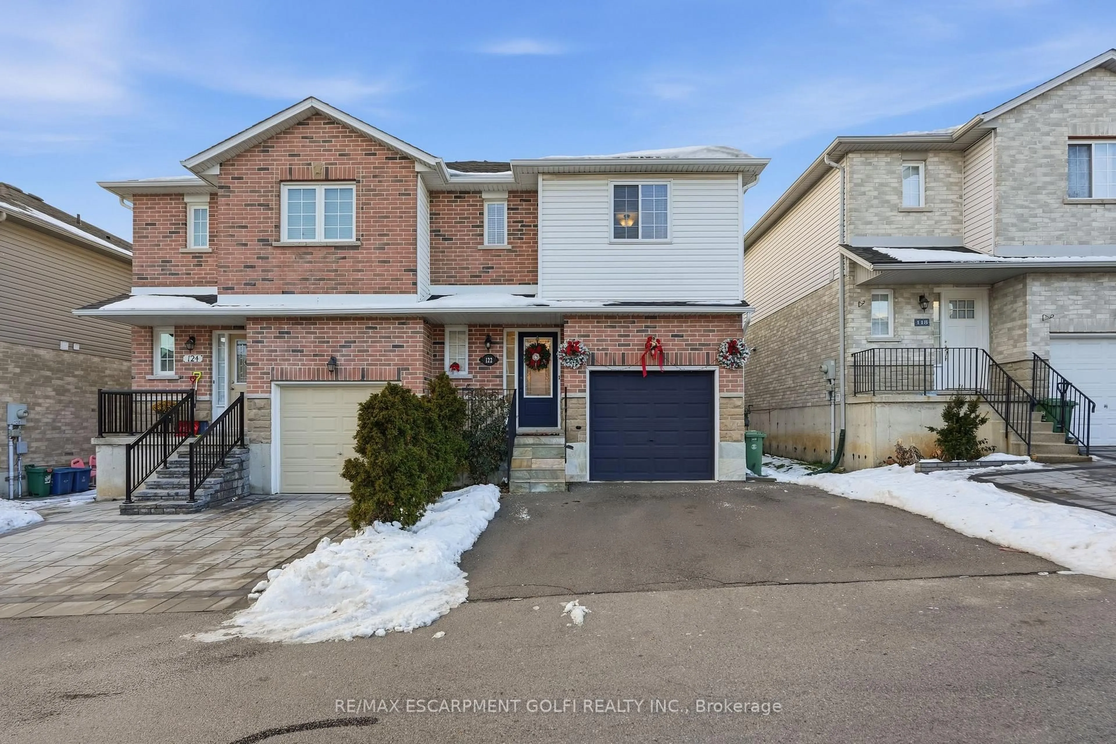 Home with brick exterior material, street for 122 Vennio Lane, Hamilton Ontario L9B 2Y7