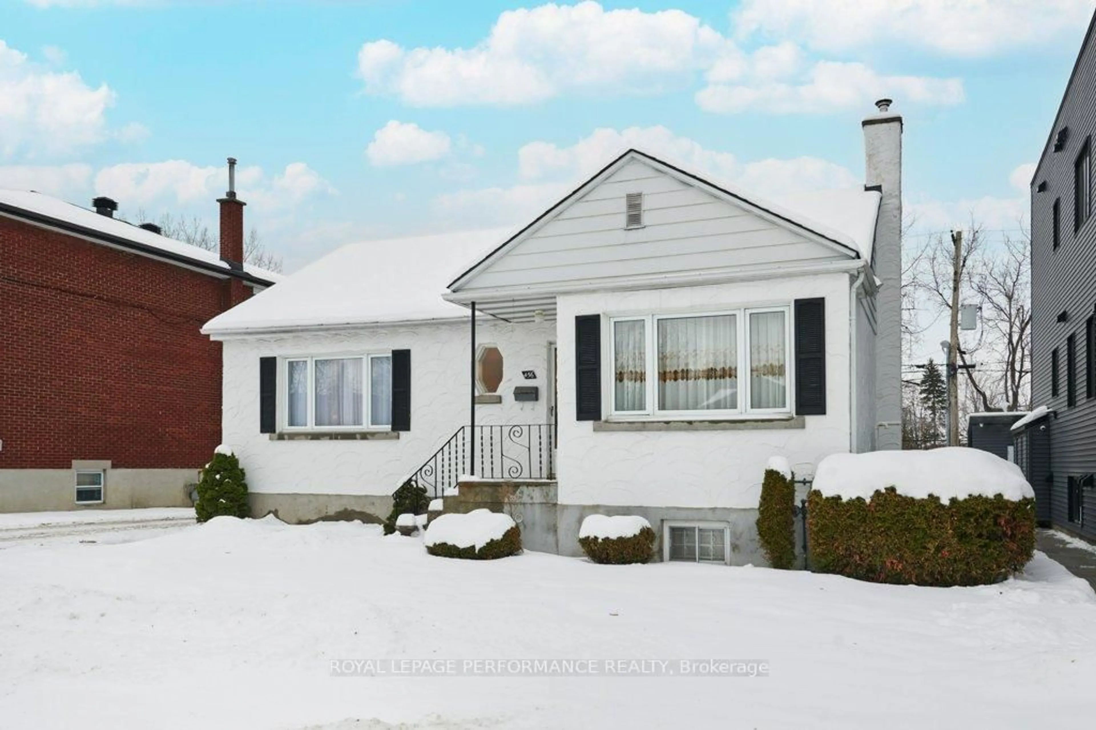 Home with vinyl exterior material, street for 456 Blake Blvd, Ottawa Ontario K1K 1B1