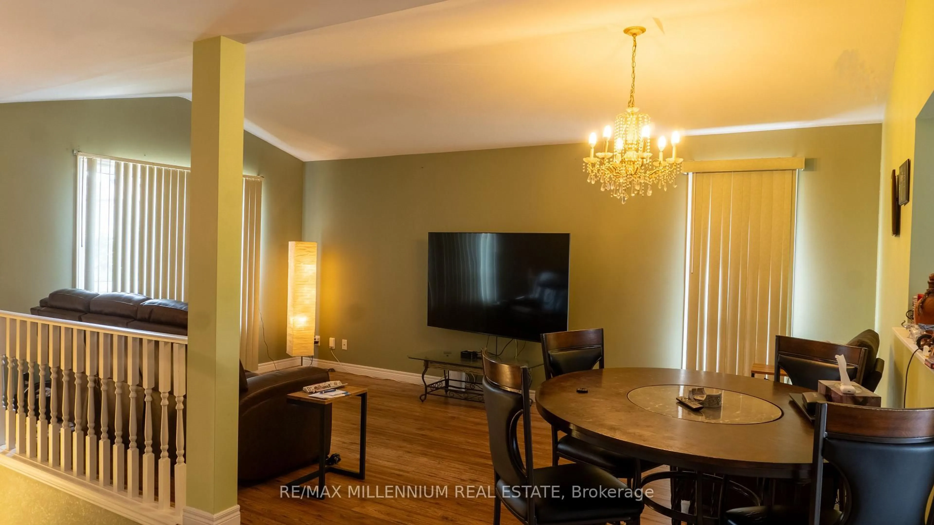 Living room with furniture, wood/laminate floor for 185 Elm Ave, Windsor Ontario N9A 5G9