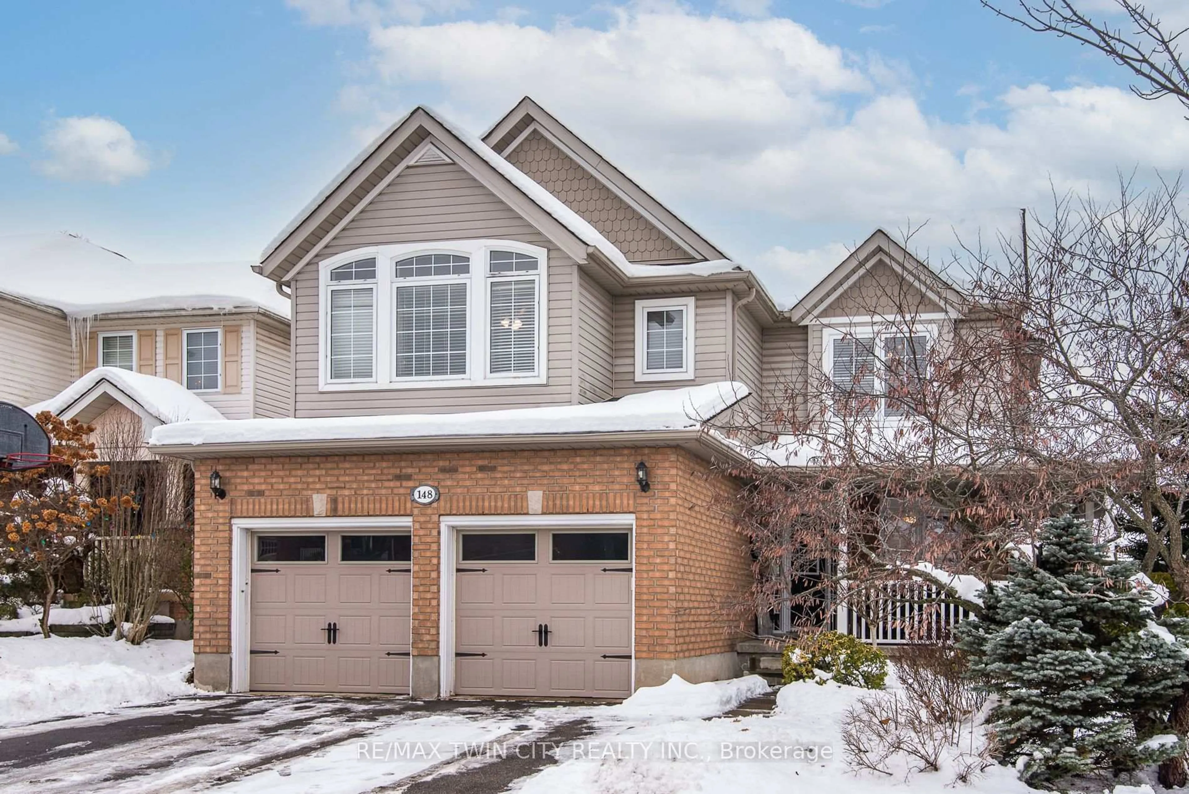 Home with brick exterior material, street for 148 Winding Wood Cres, Kitchener Ontario N2P 2L6