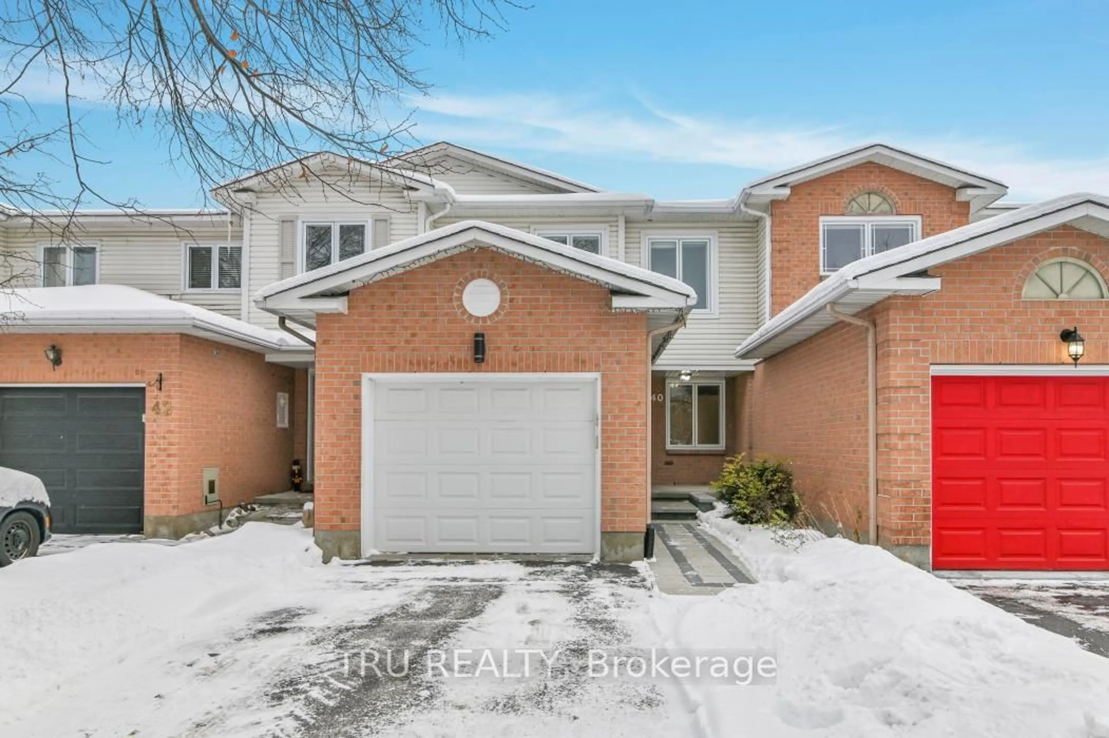 Home with brick exterior material, street for 40 Baton Crt, Kanata Ontario K2L 4C8