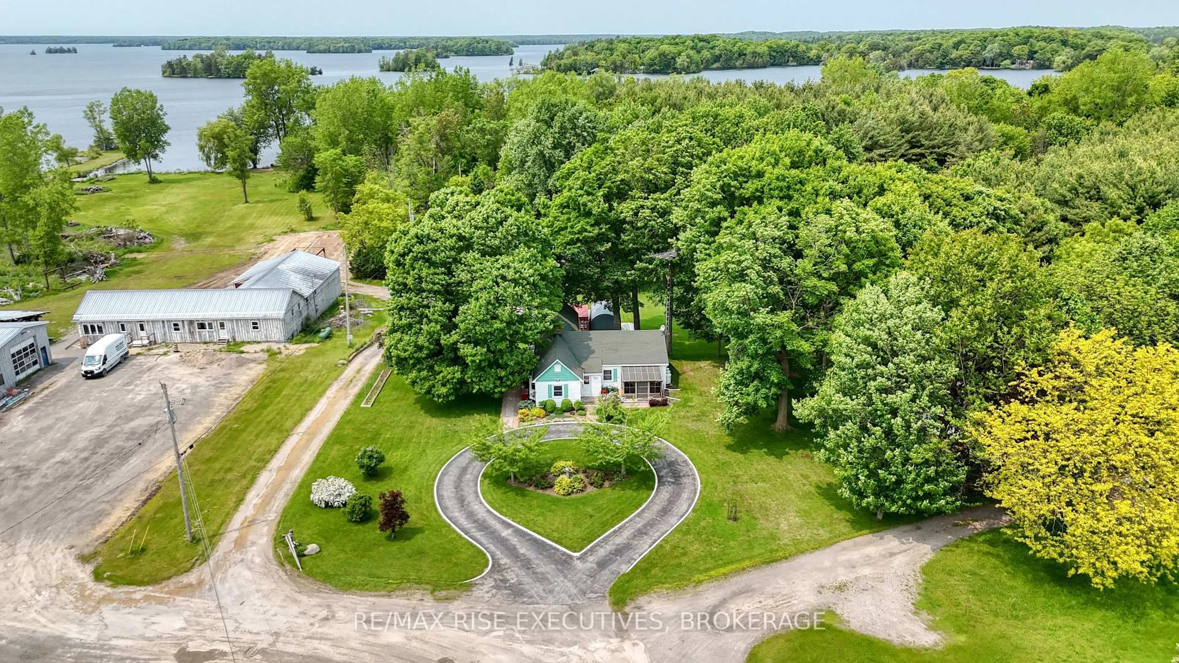 A pic from outside/outdoor area/front of a property/back of a property/a pic from drone, water/lake/river/ocean view for 204 R33, Rideau Lakes Ontario K0G 1V0