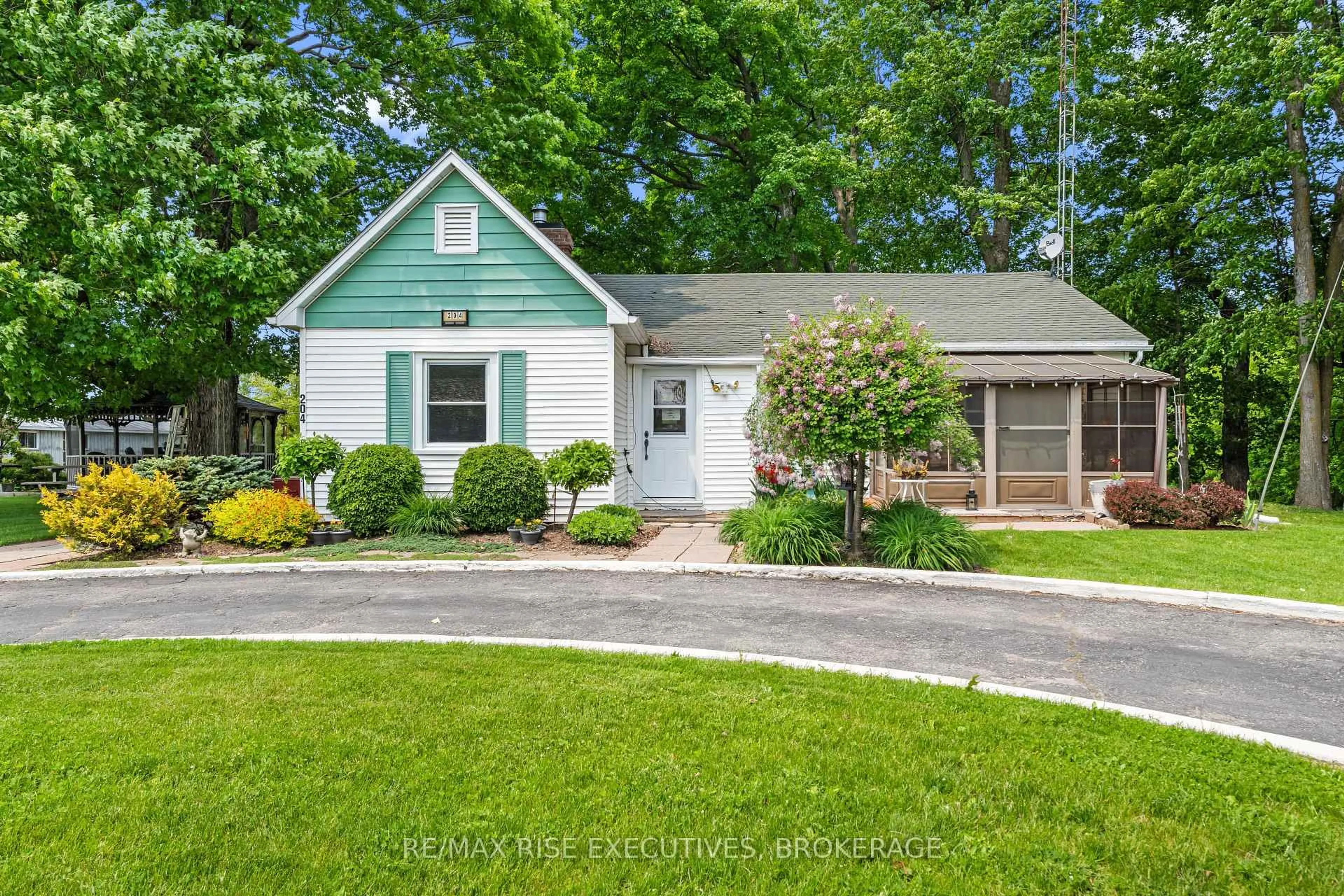 Home with vinyl exterior material, street for 204 R33, Rideau Lakes Ontario K0G 1V0