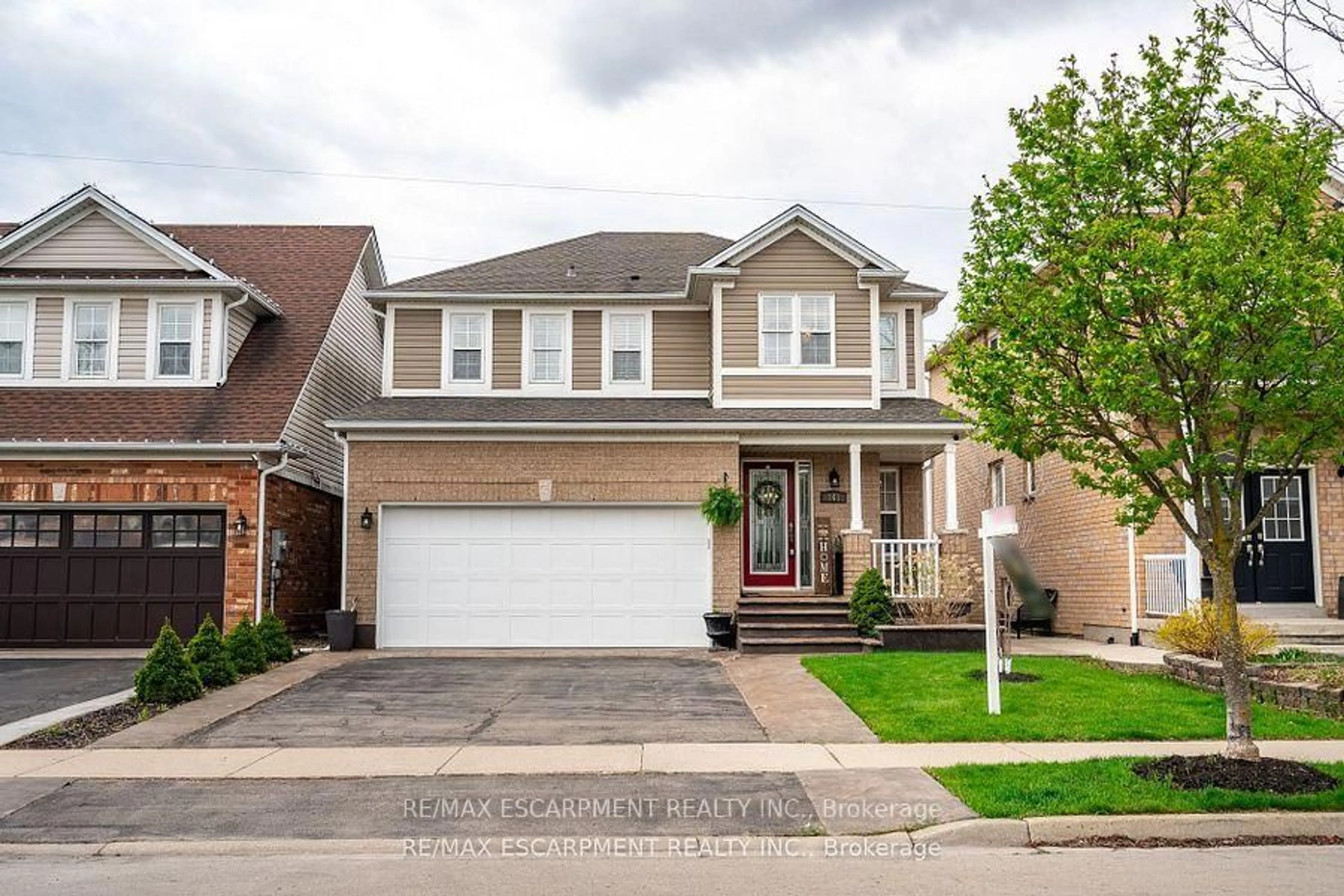 Home with brick exterior material, street for 141 Voyager Pass, Hamilton Ontario L0R 1C0