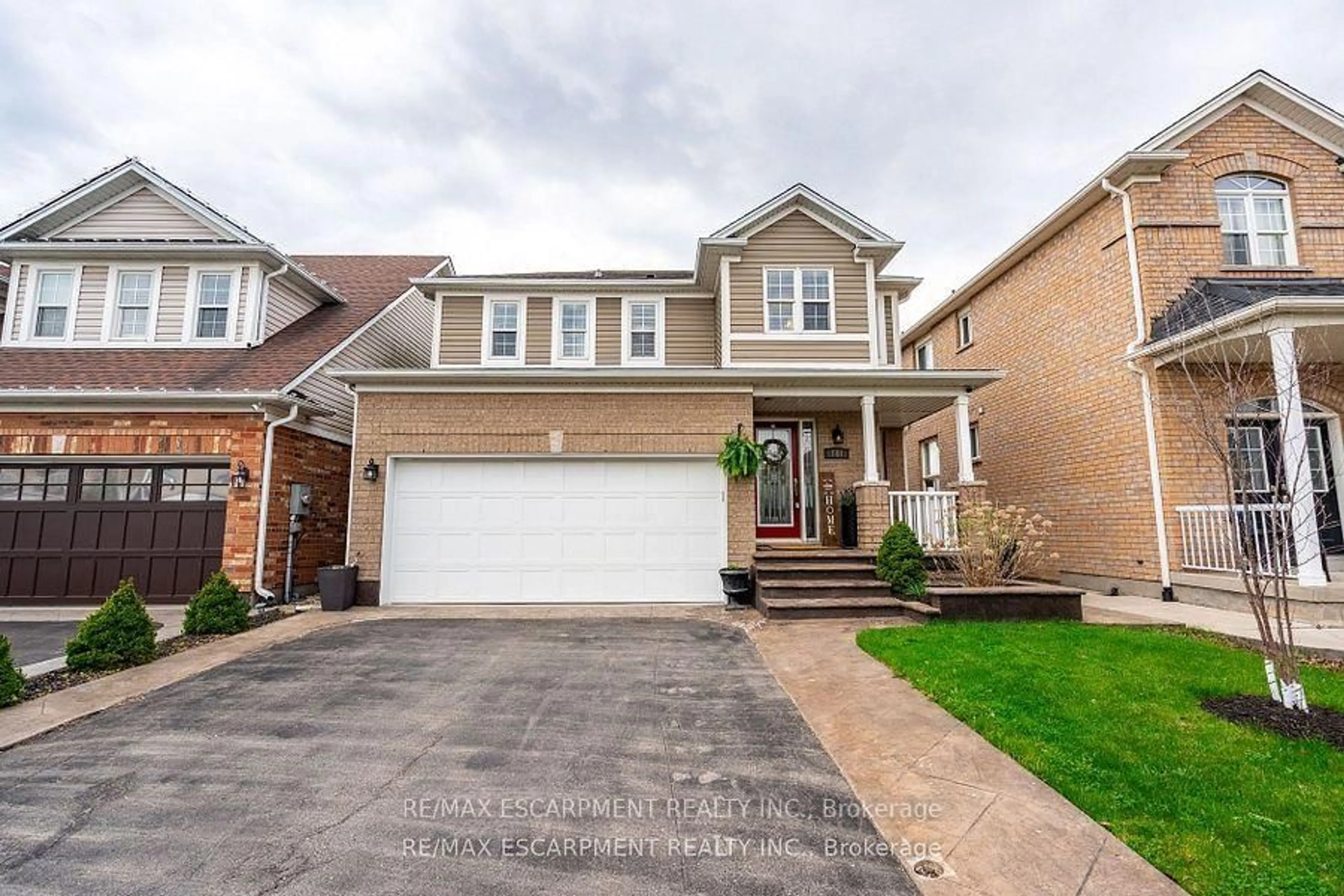 Home with brick exterior material, street for 141 Voyager Pass, Hamilton Ontario L0R 1C0