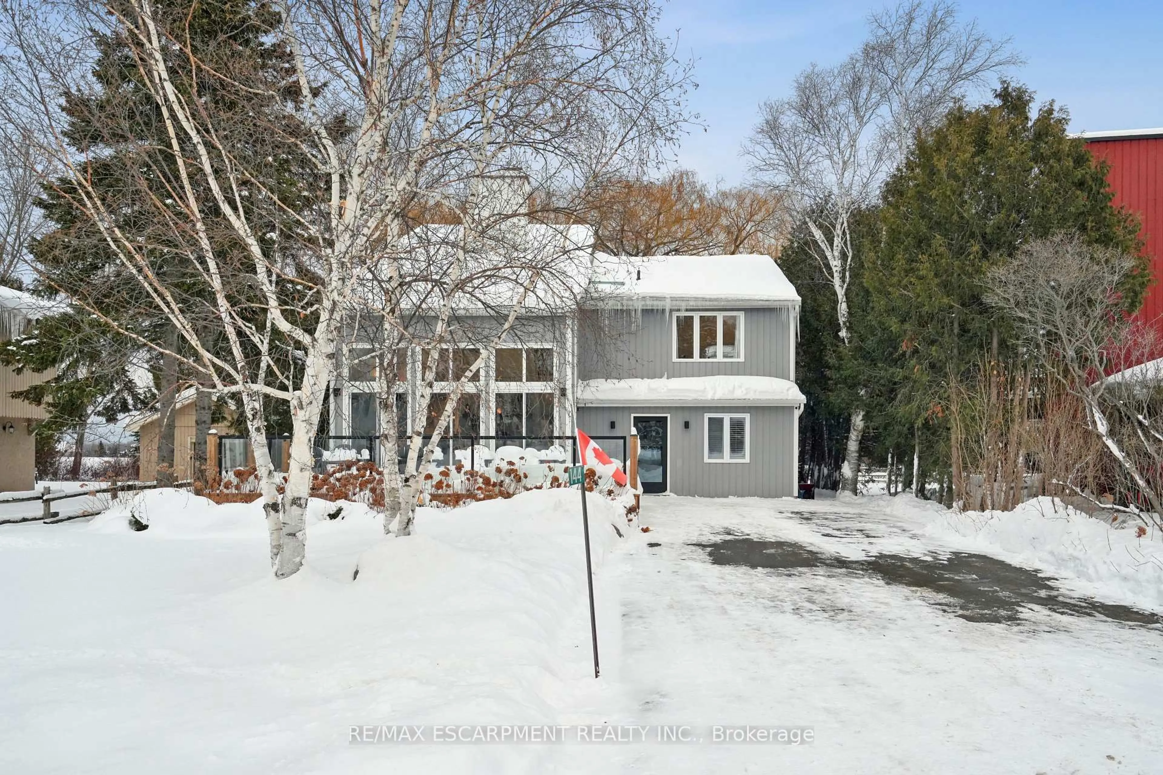 A pic from outside/outdoor area/front of a property/back of a property/a pic from drone, street for 144 Carmichael Cres, Blue Mountains Ontario L9Y 0R3