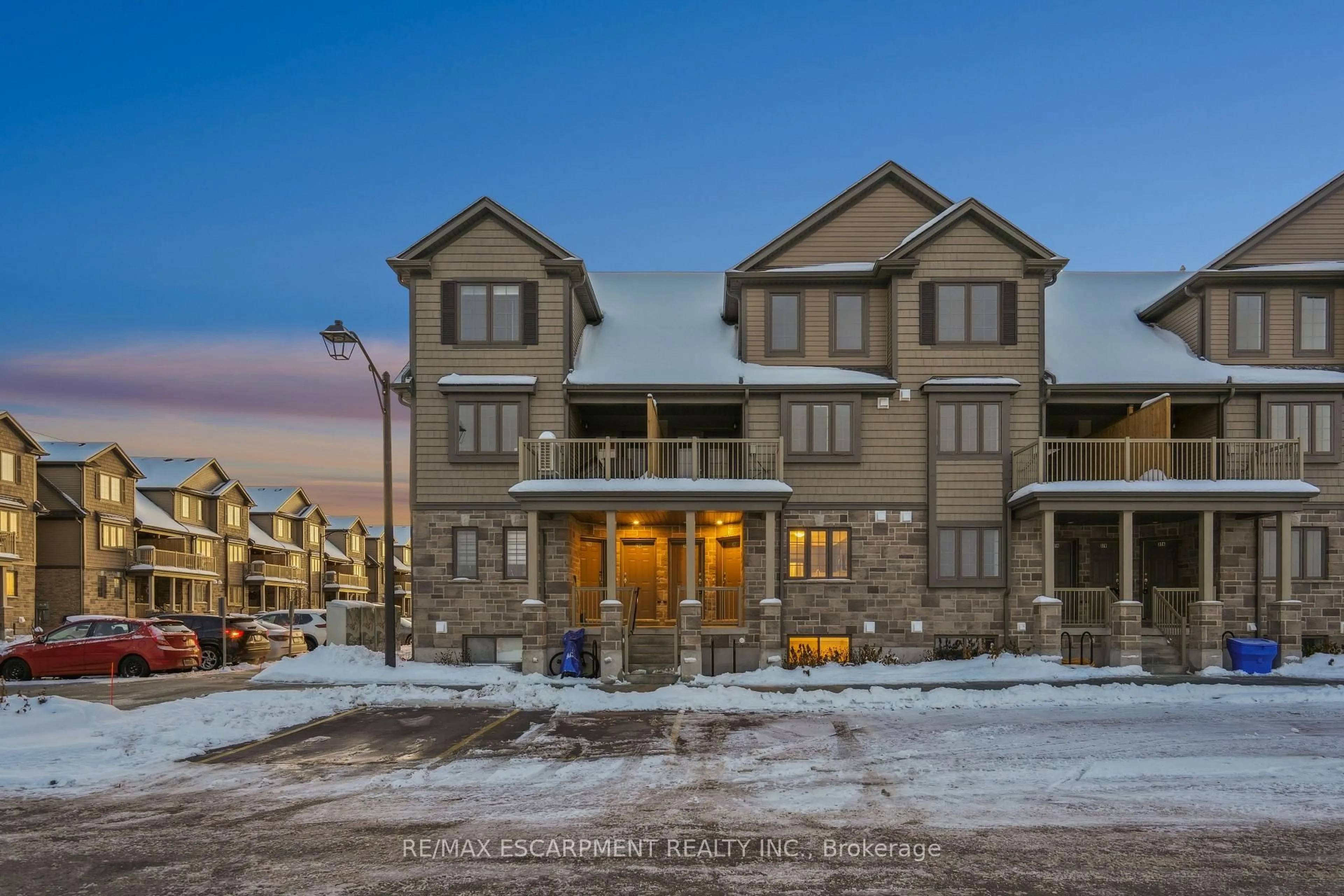 A pic from outside/outdoor area/front of a property/back of a property/a pic from drone, unknown for 85 Mullin Dr #30A, Guelph Ontario N1E 0R4