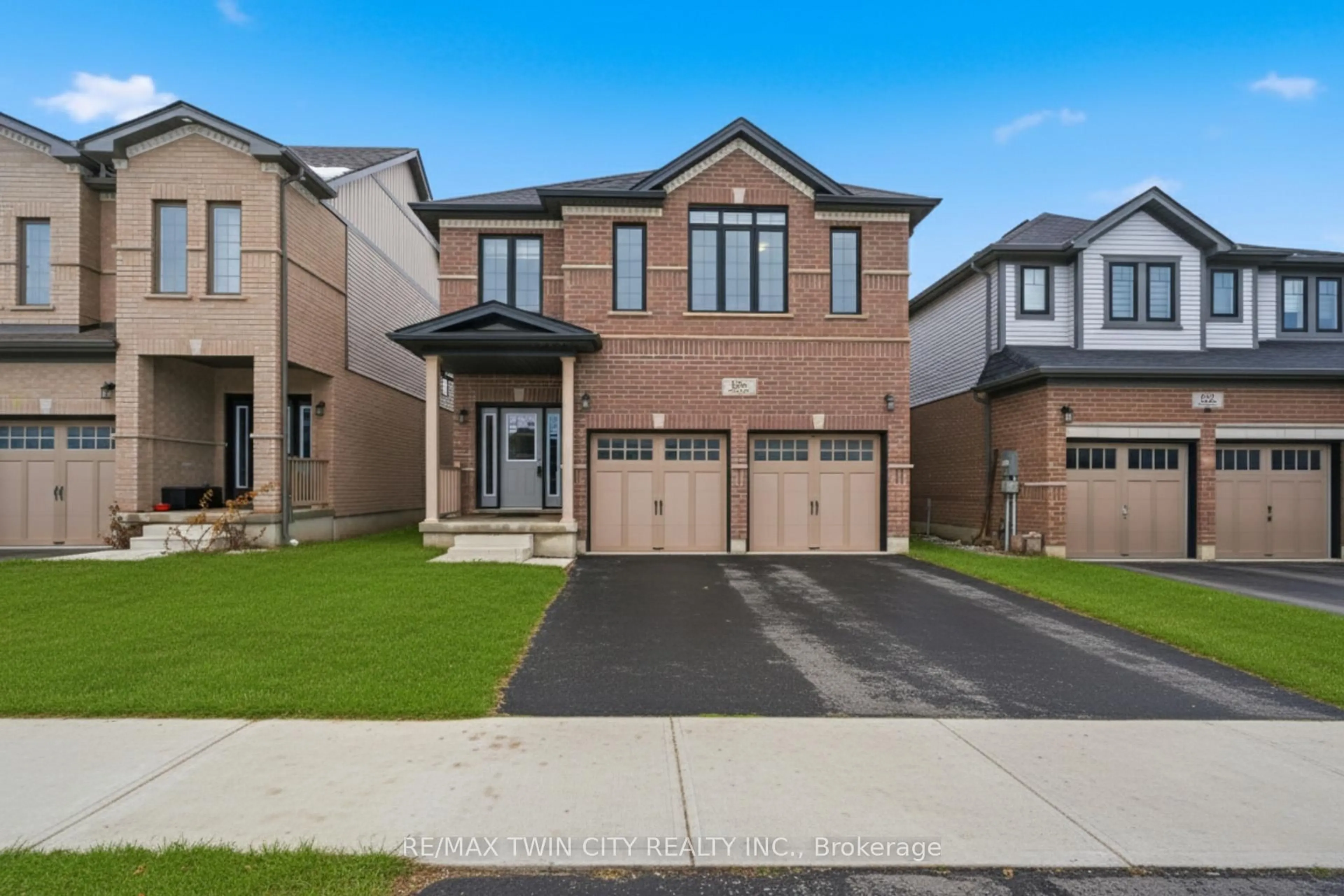Home with brick exterior material, street for 126 Tartan Ave, Kitchener Ontario N2R 0N4