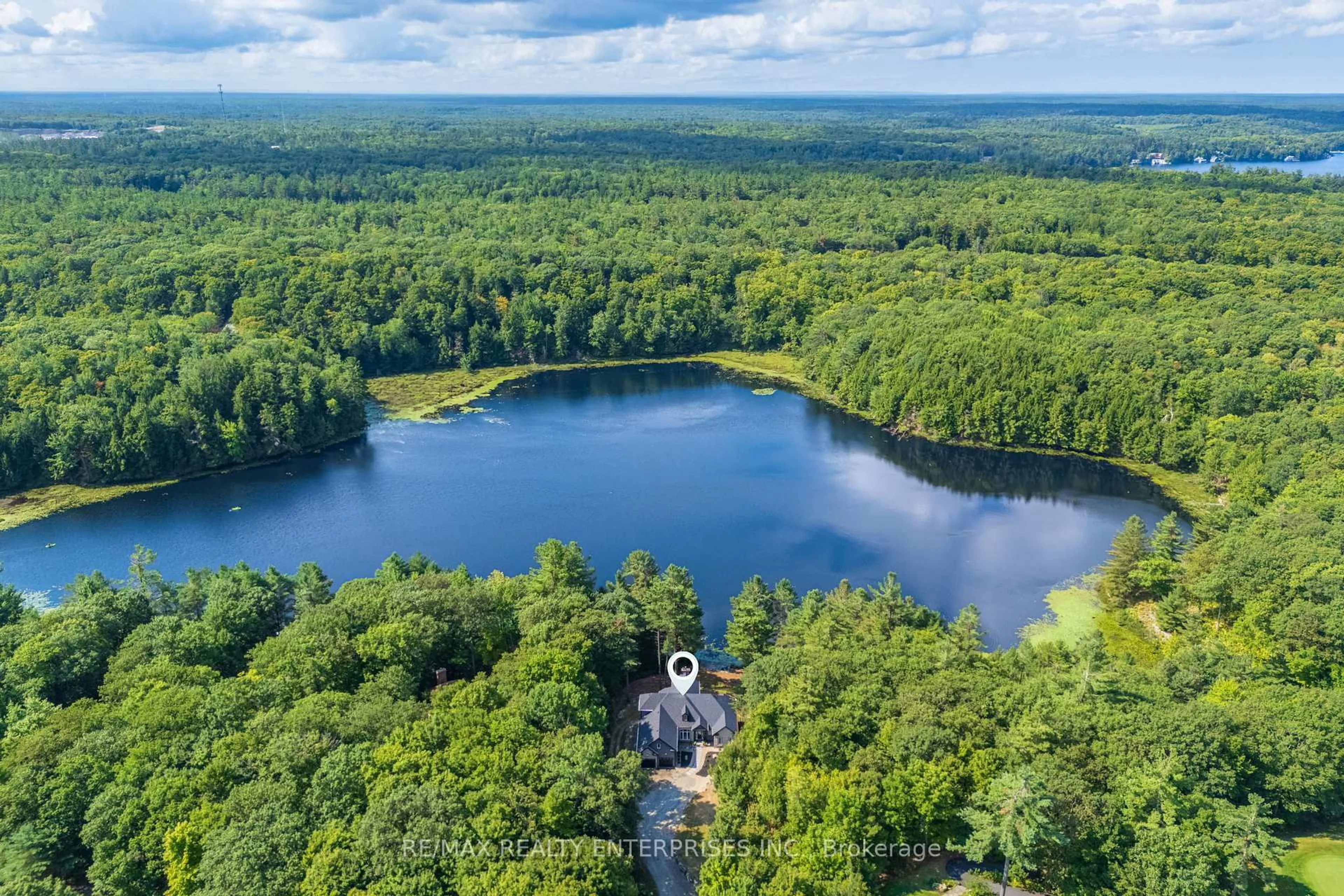 A pic from outside/outdoor area/front of a property/back of a property/a pic from drone, water/lake/river/ocean view for 49 Estates Dr, Muskoka Lakes Ontario P0B 1J0