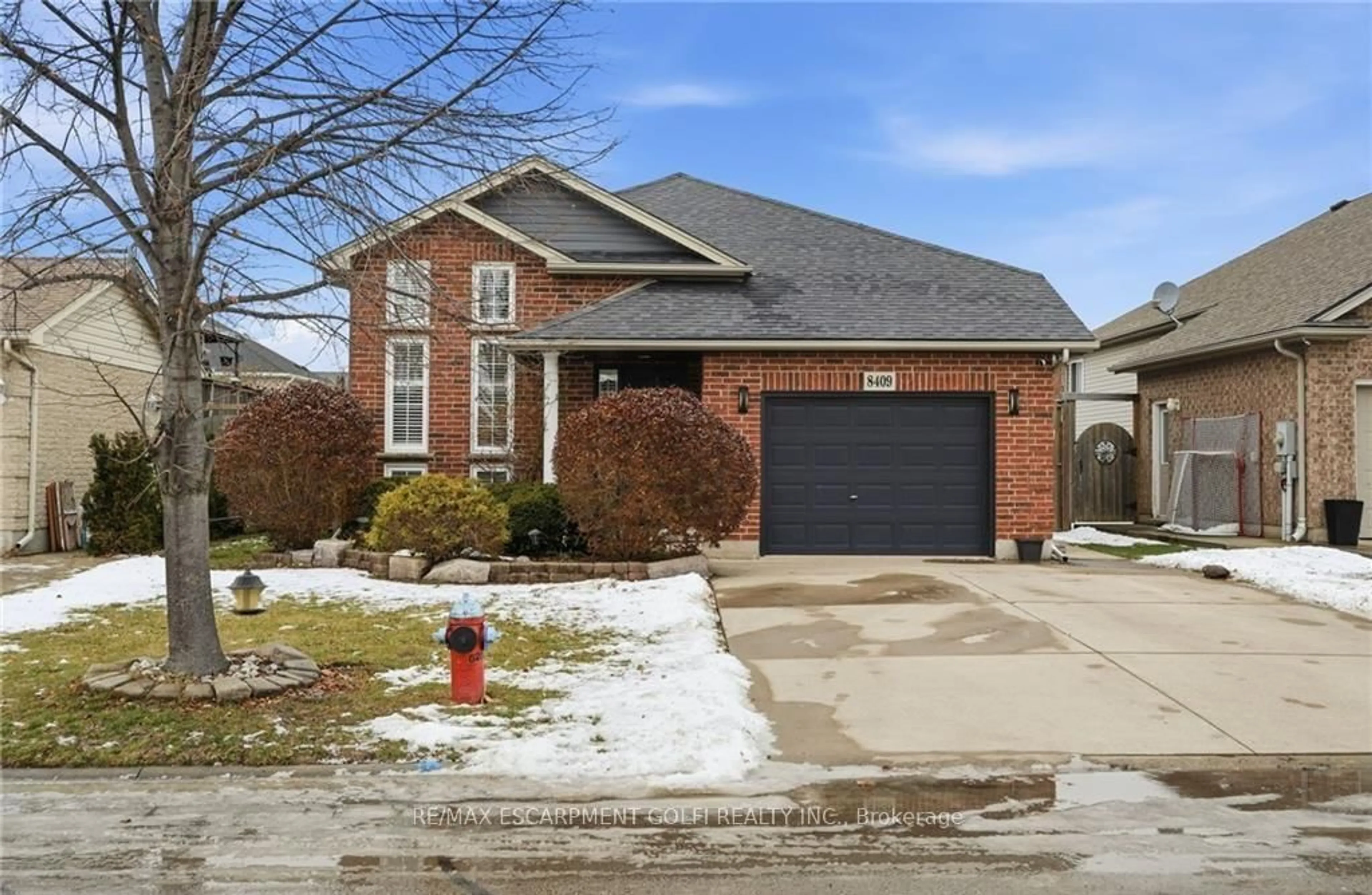 Home with brick exterior material, street for 8409 Greenfield Cres, Niagara Falls Ontario L2H 3J8