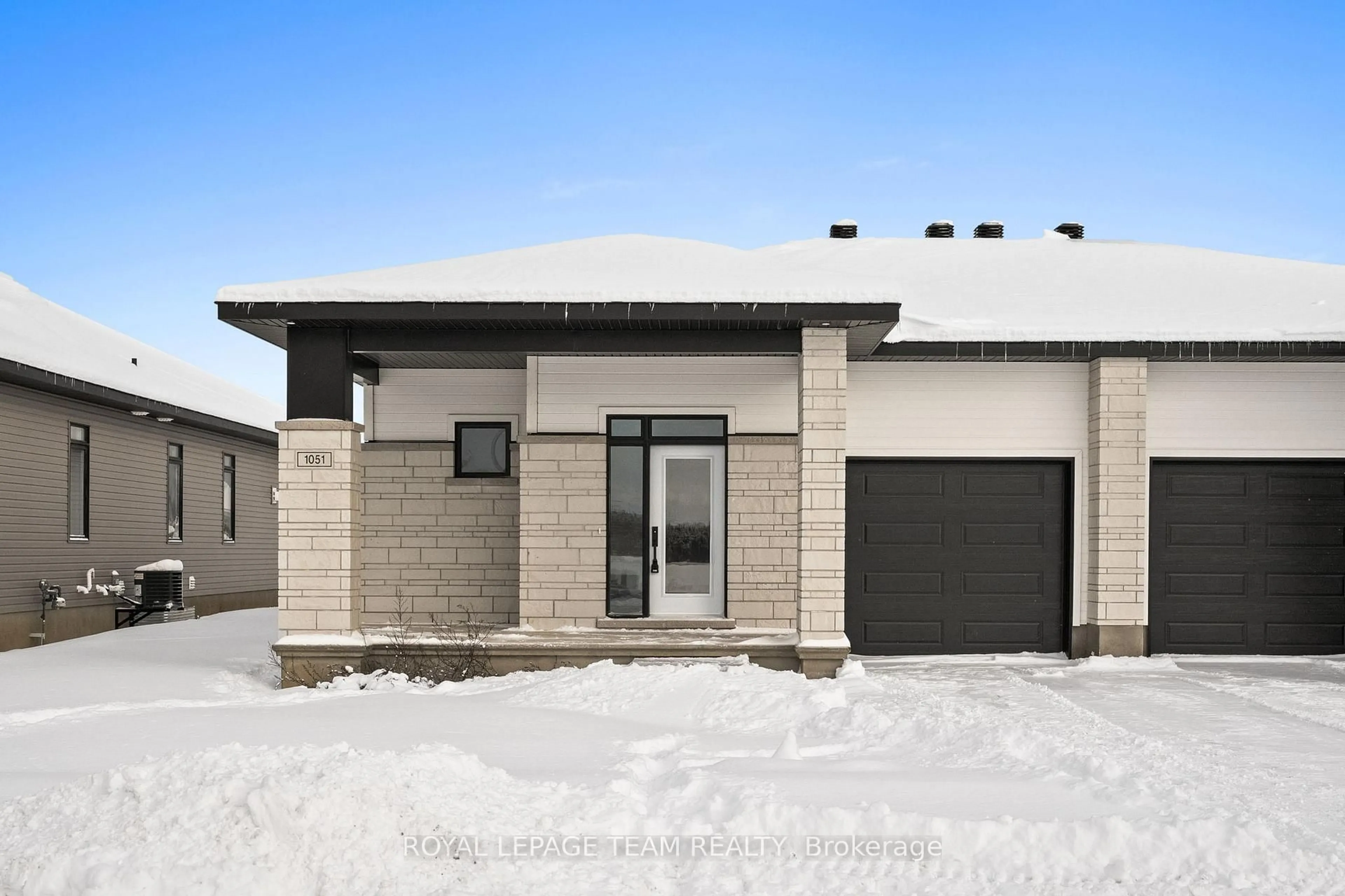 Home with brick exterior material, street for 1051 Moore St, Brockville Ontario K6V 0H1