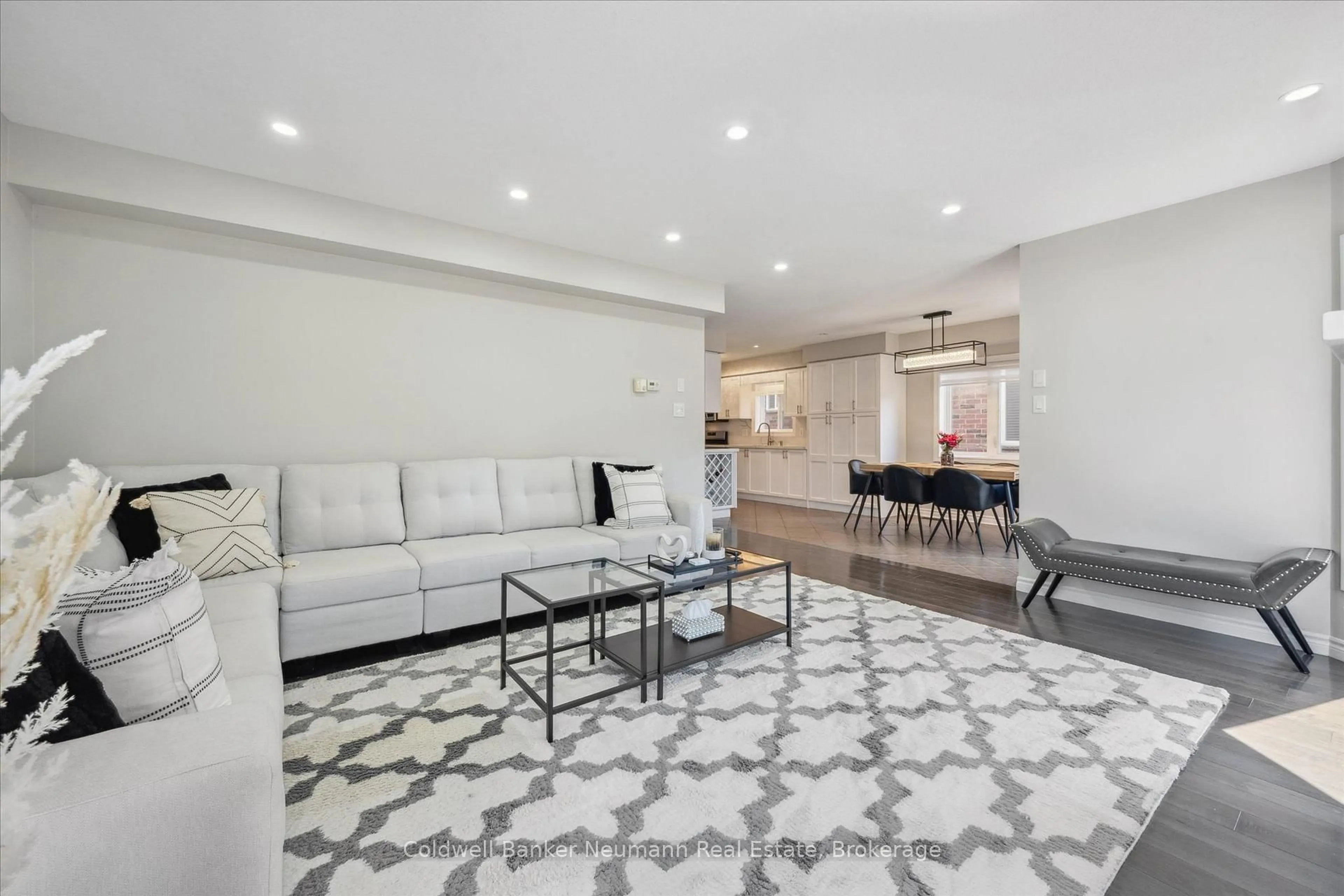 Living room with furniture, ceramic/tile floor for 64 Laughland Lane, Guelph Ontario N1L 0C6